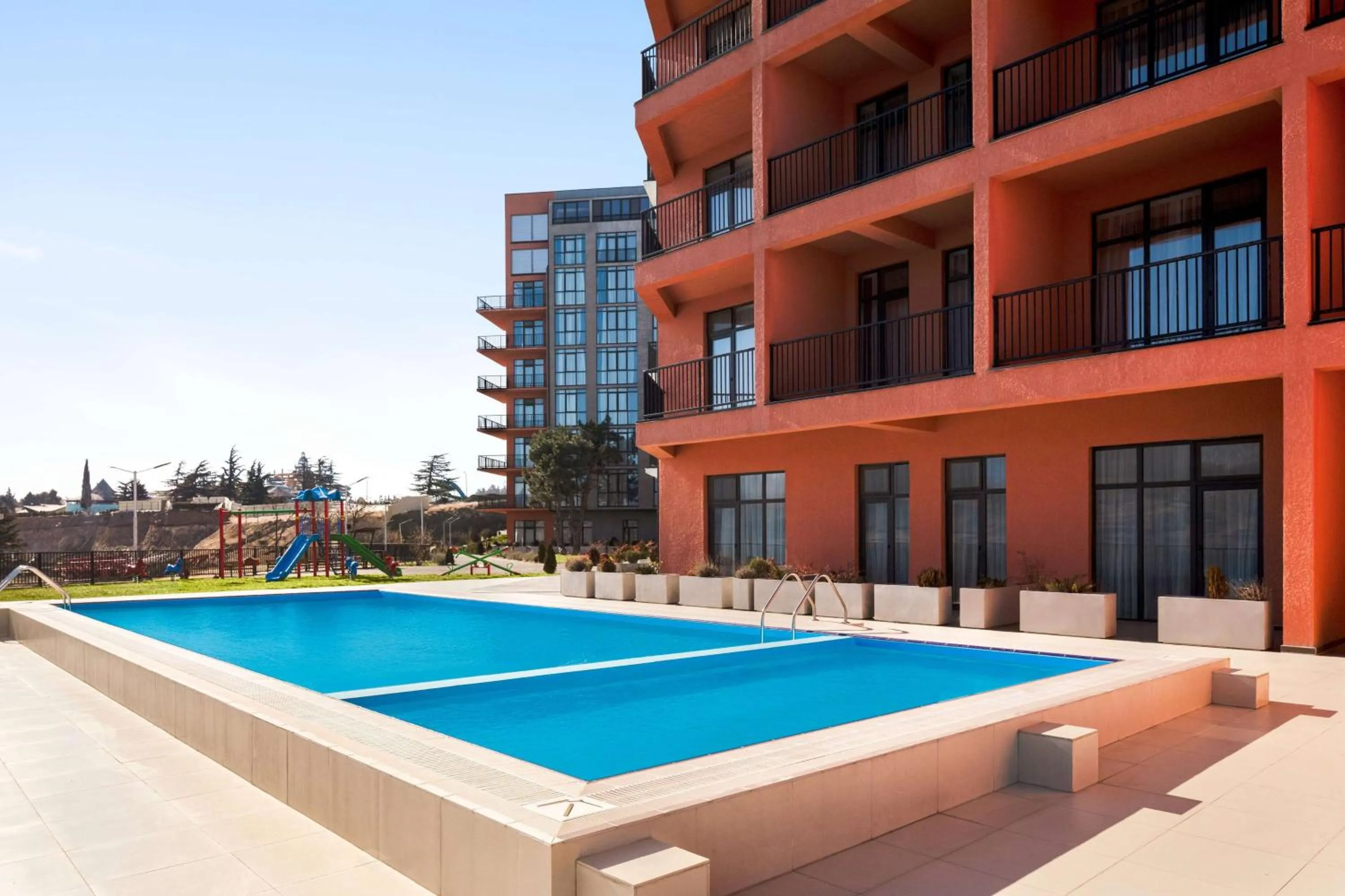 Pool view in Gino Seaside Tbilisi, Trademark Collection by Wyndham