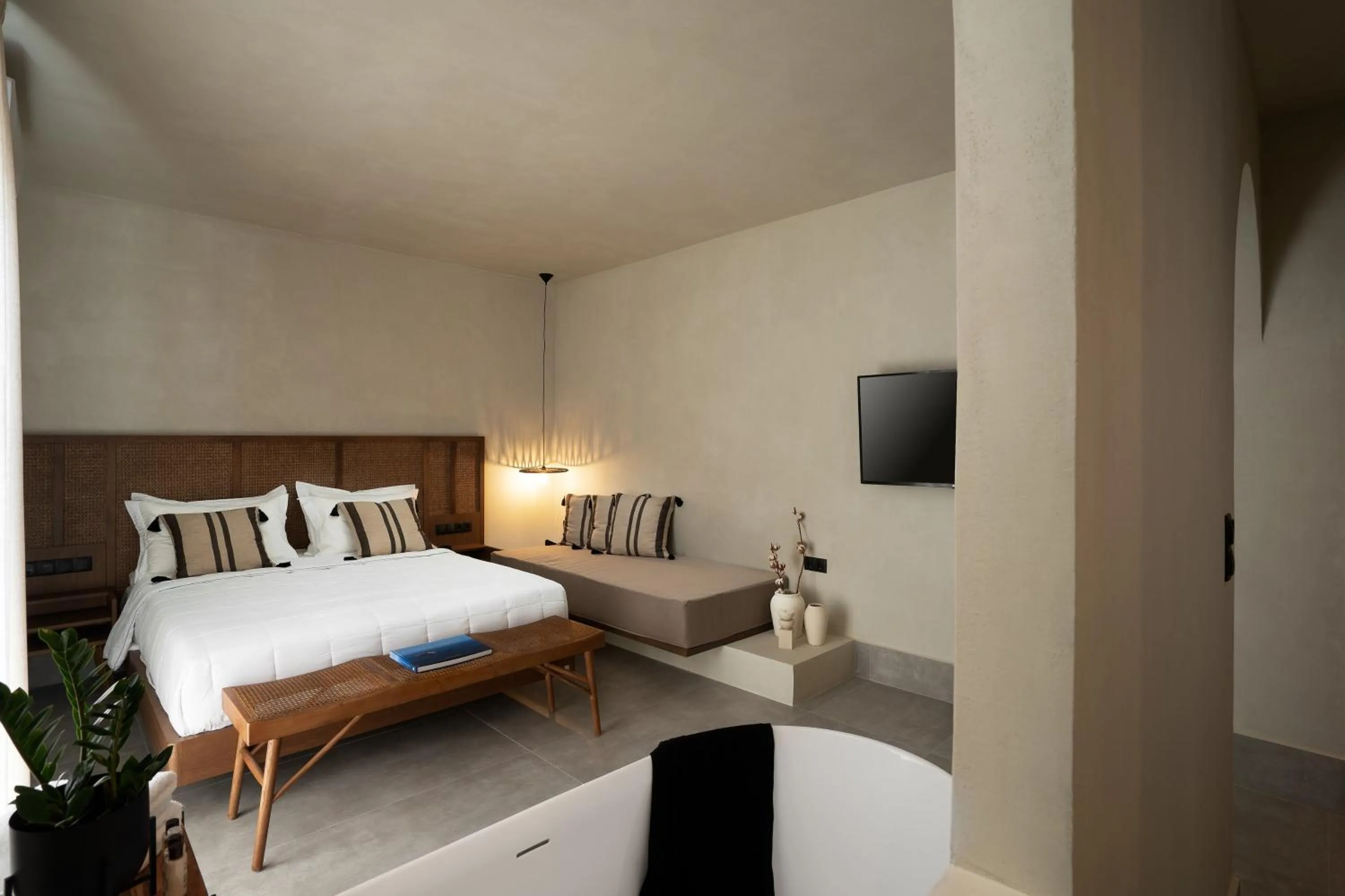 Bed in Polis of Naxos Stylish Suites