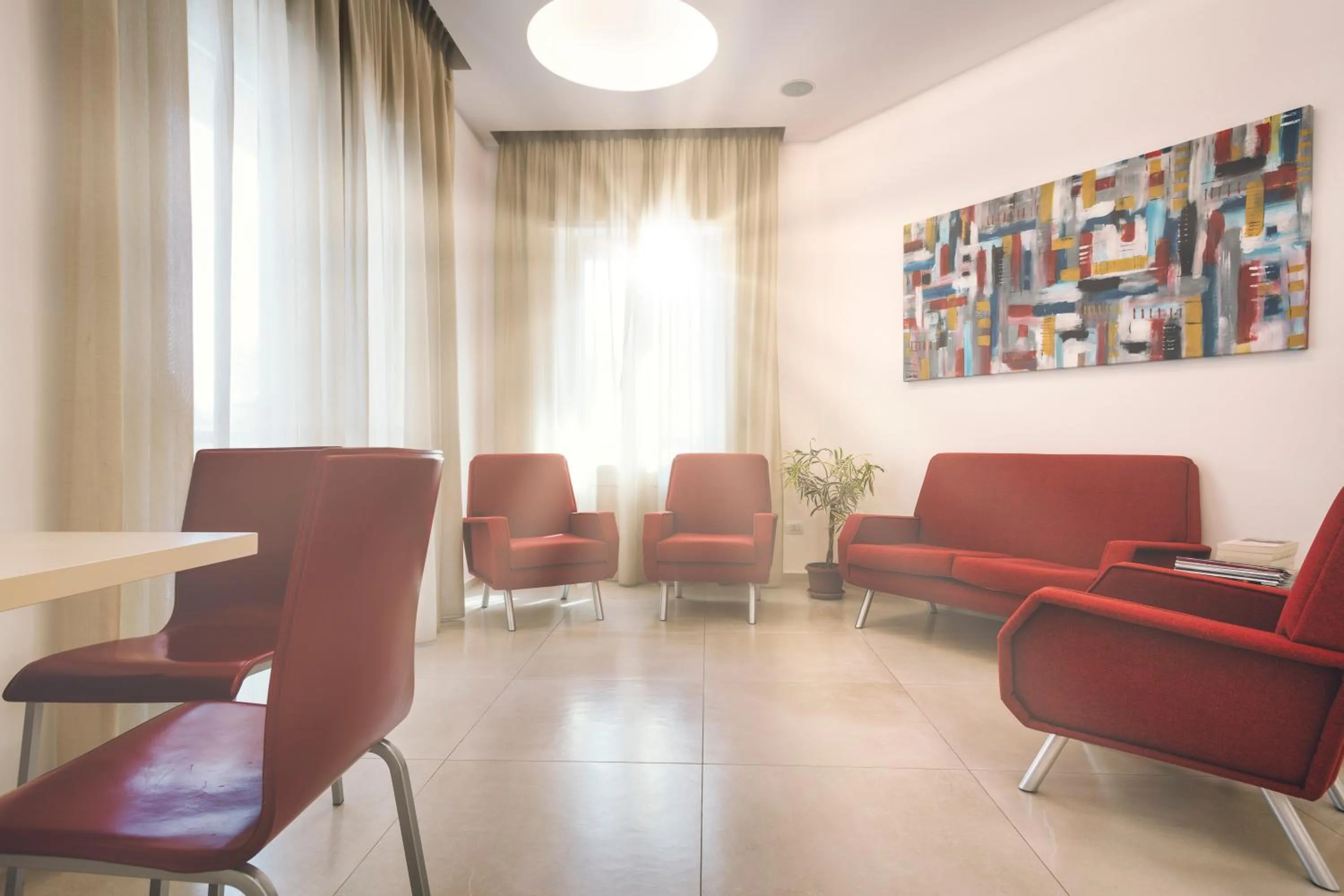 Communal lounge/ TV room in Hotel Dei Sette