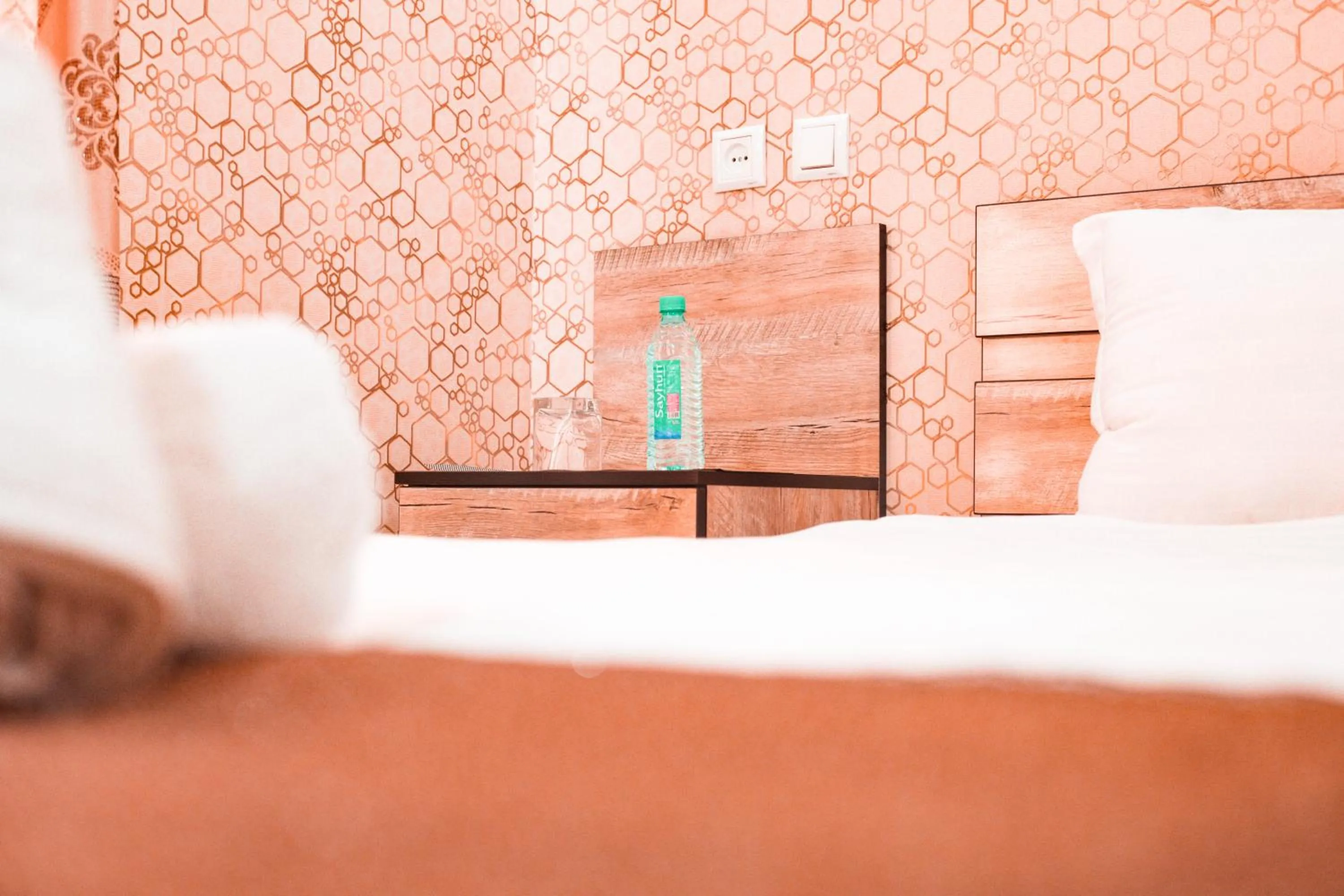 Photo of the whole room, Bed in Reikartz City Kokand