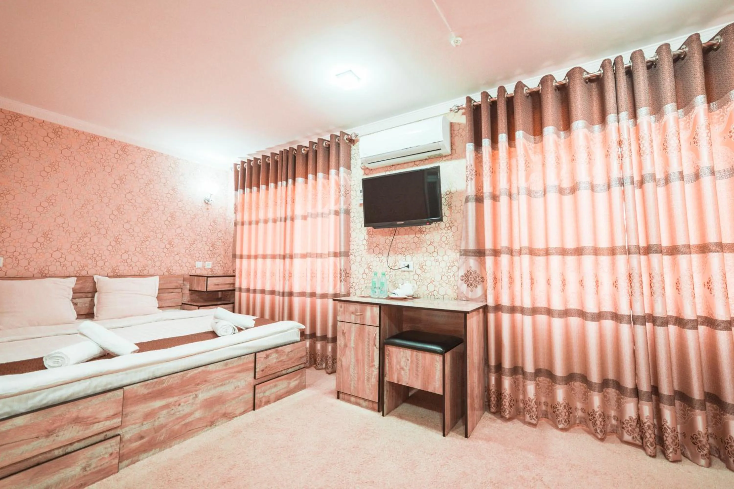 Photo of the whole room, Bed in Reikartz City Kokand