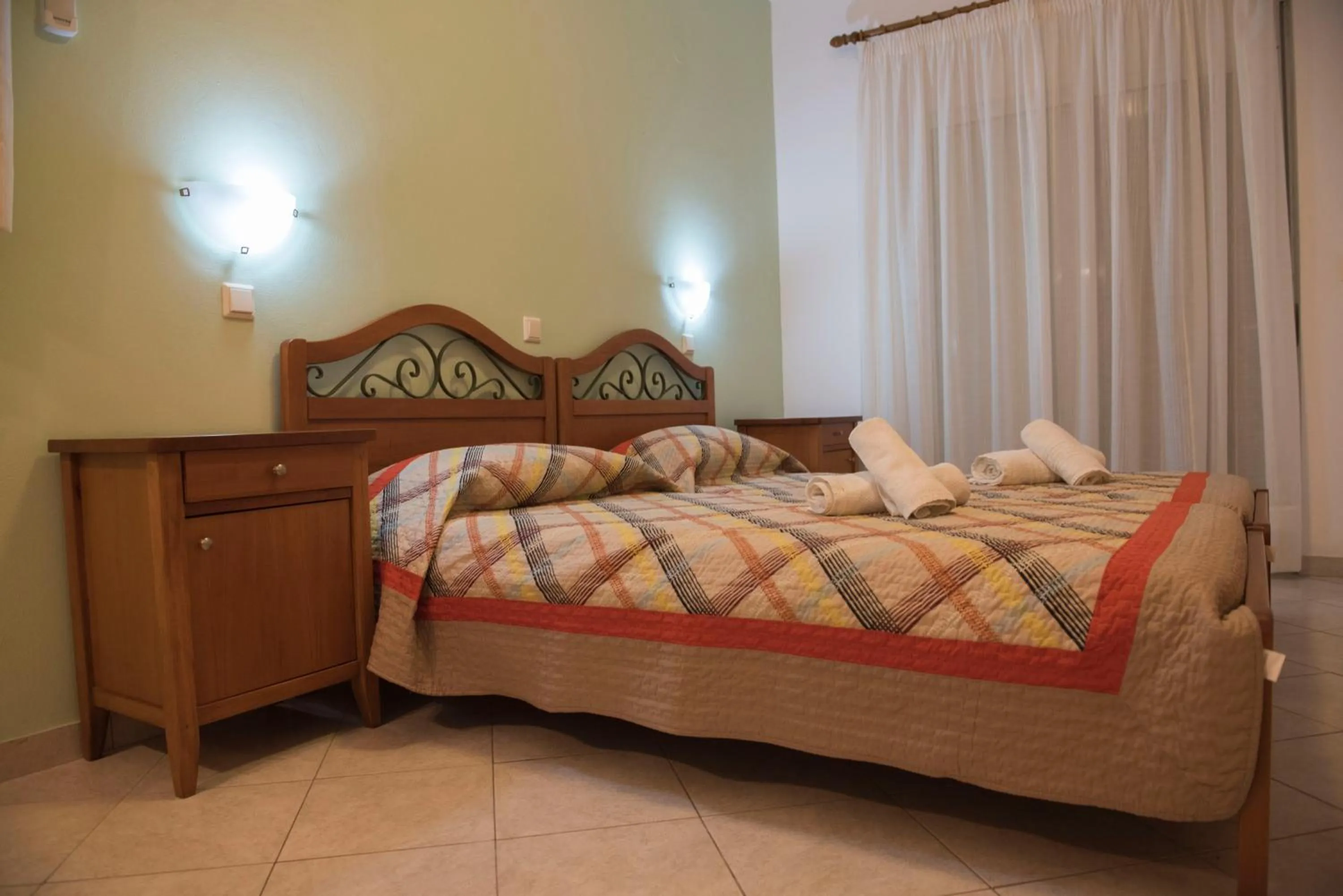 Bedroom, Bed in Nephele Apartments