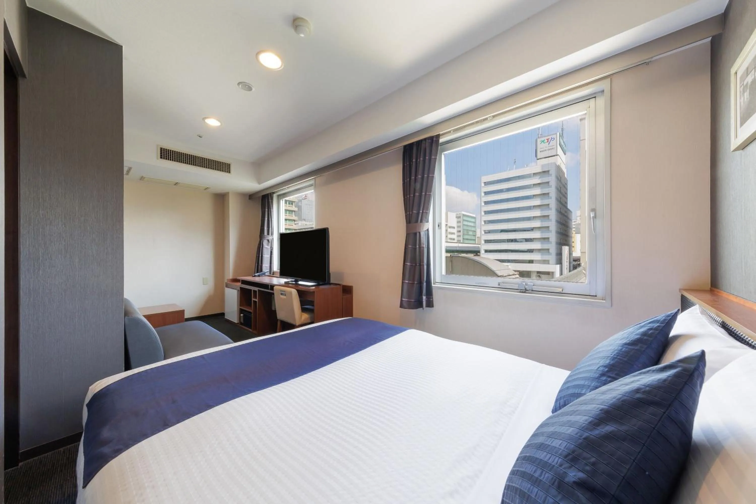Photo of the whole room, Bed in HOTEL MYSTAYS Nagoya Sakae