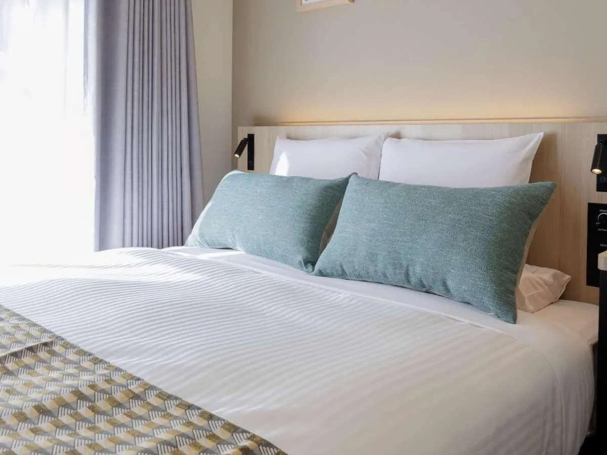Photo of the whole room, Bed in HOTEL MYSTAYS Nagoya Sakae