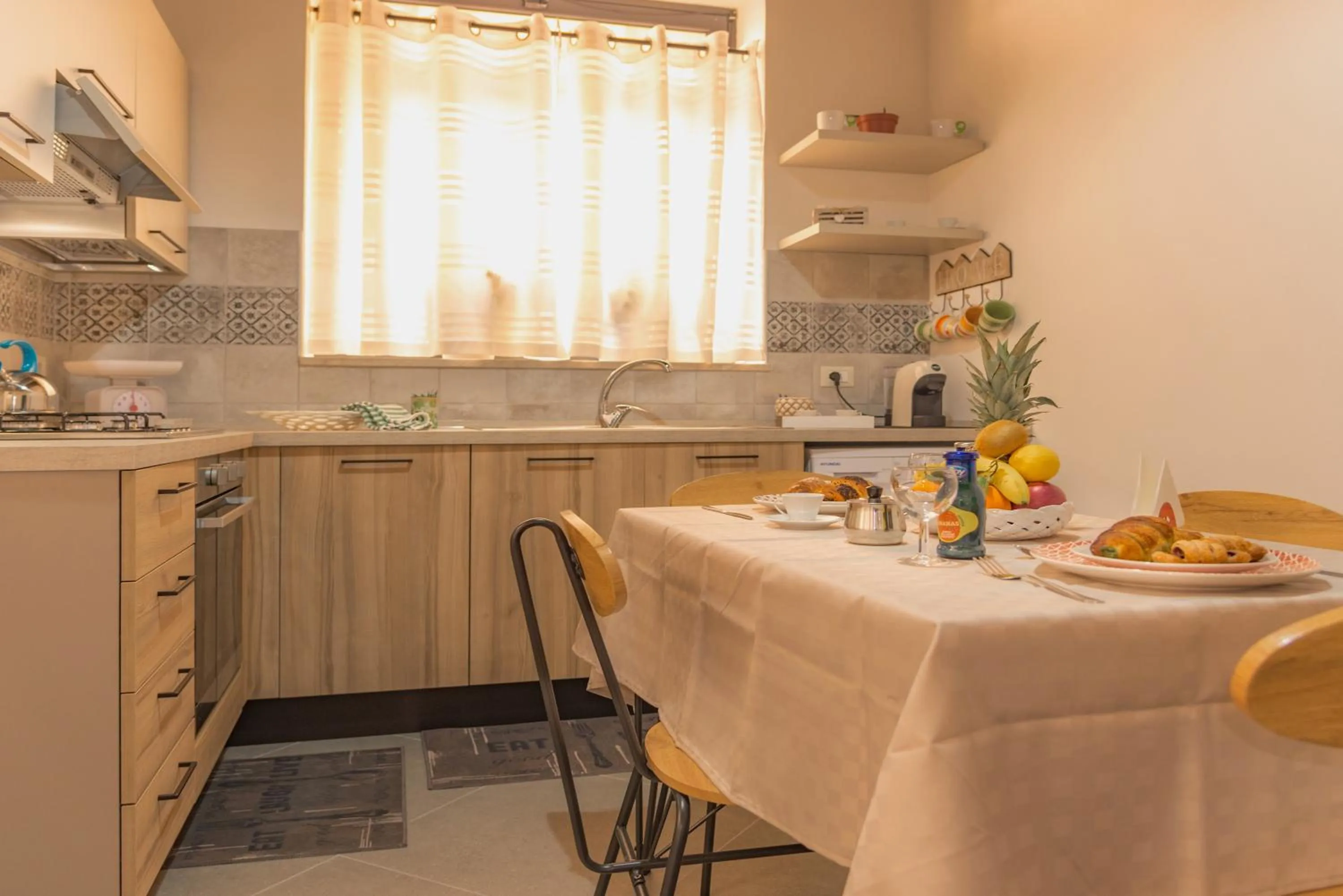 Kitchen or kitchenette in AMUNI' Apartments