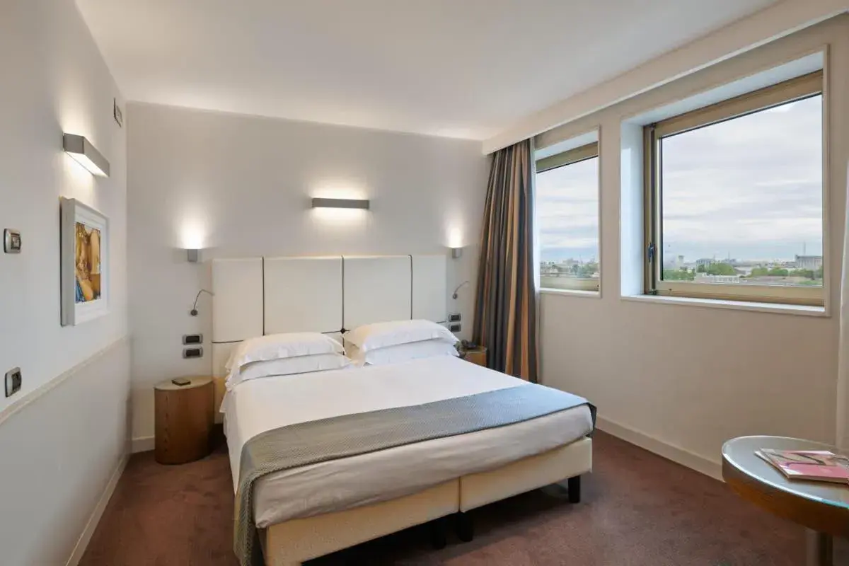 Bed in Hotel Plaza Bed in Hotel Plaza