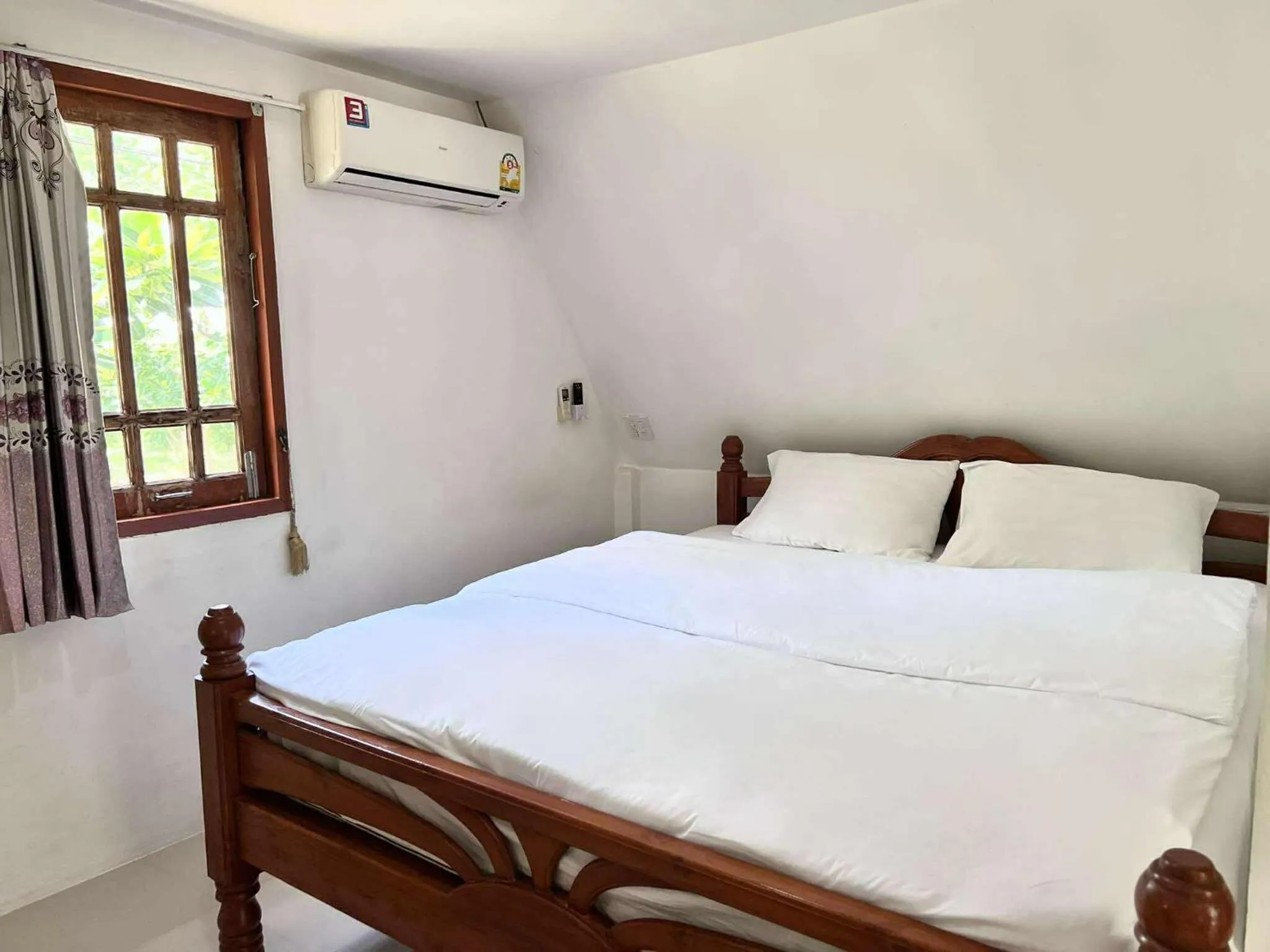 Bed in Pijittra Resort