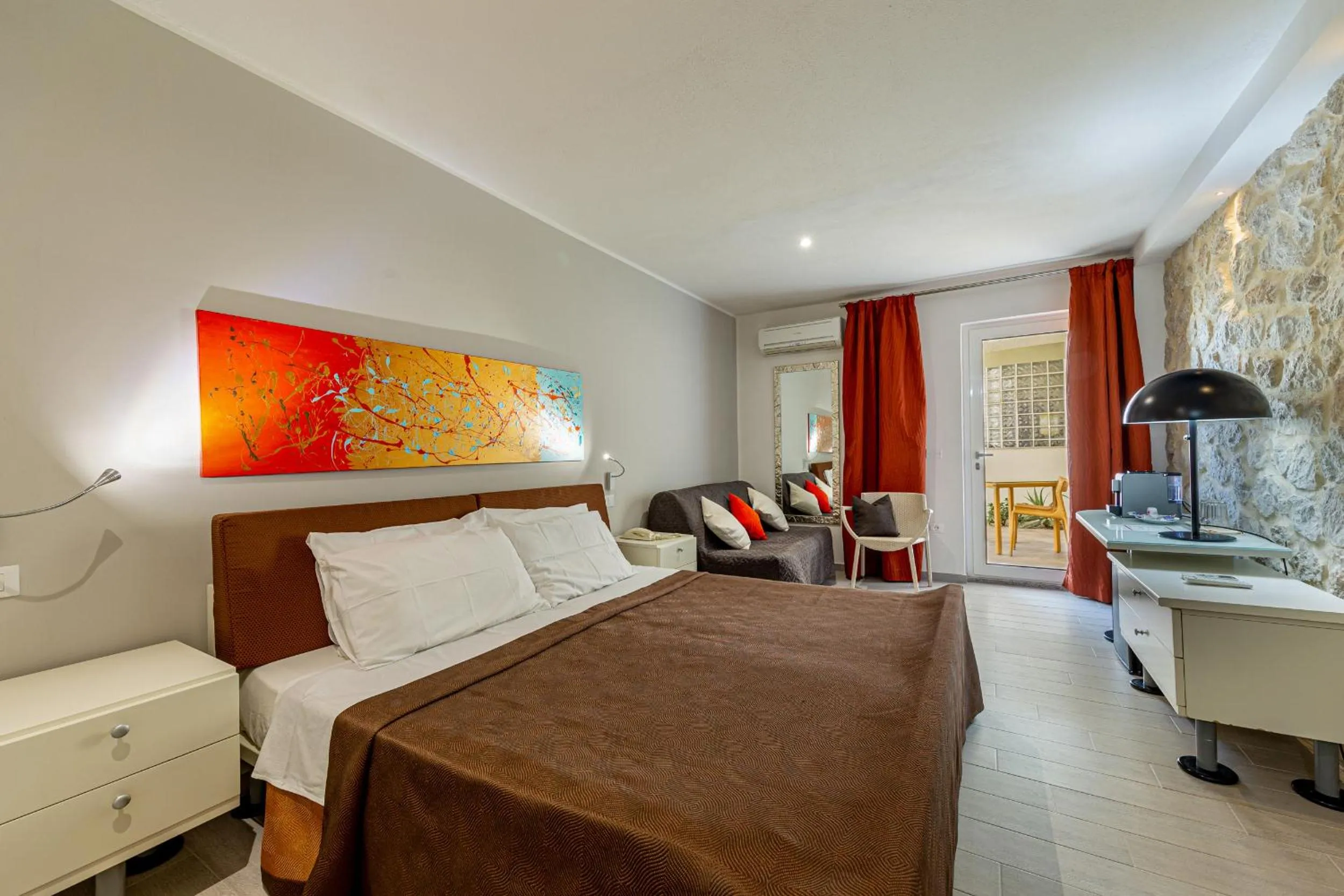 Bed in Hotel Residence Hibiscus