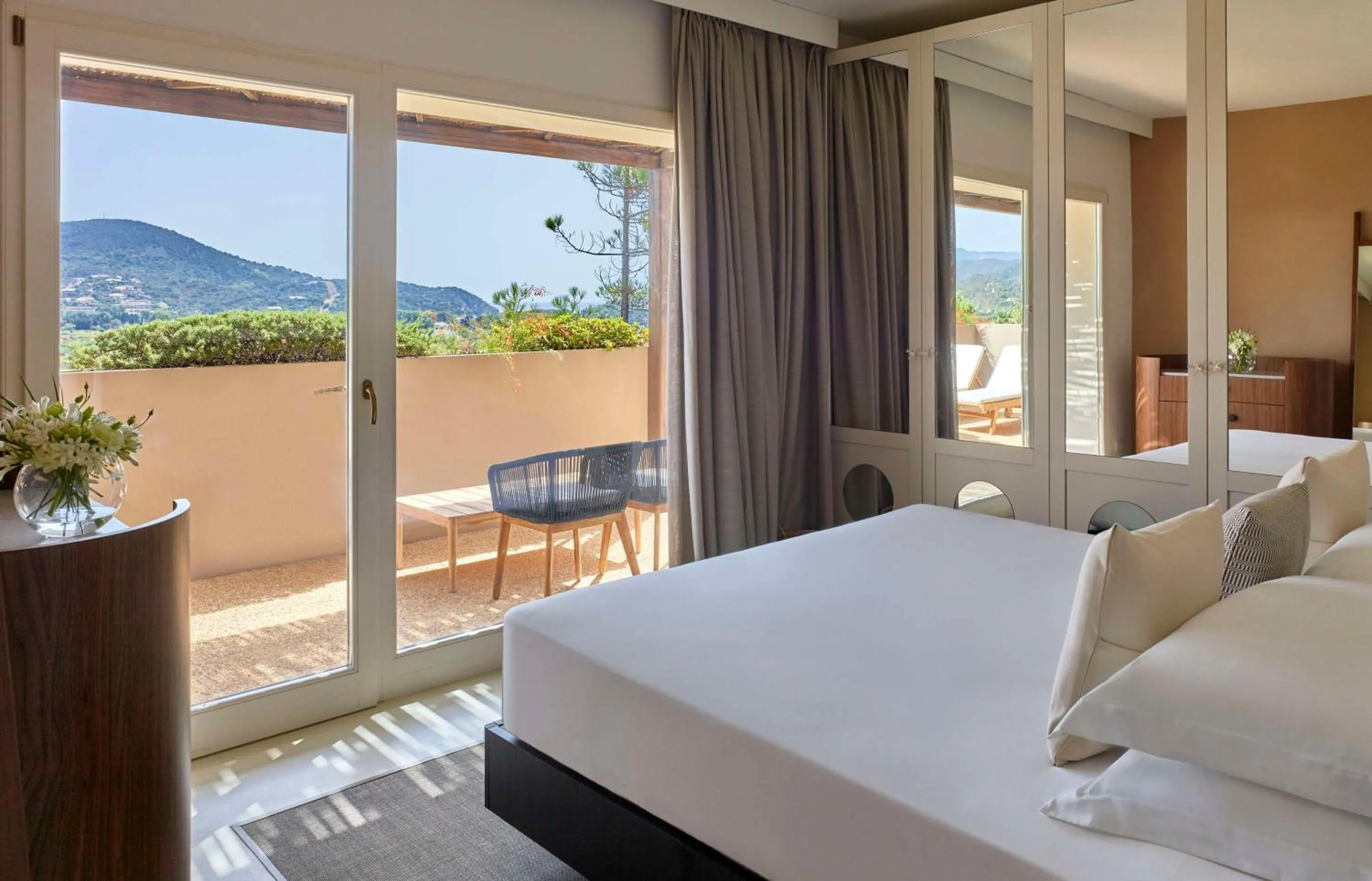 Bed in Baia Di Chia Resort Sardinia, Curio Collection By Hilton