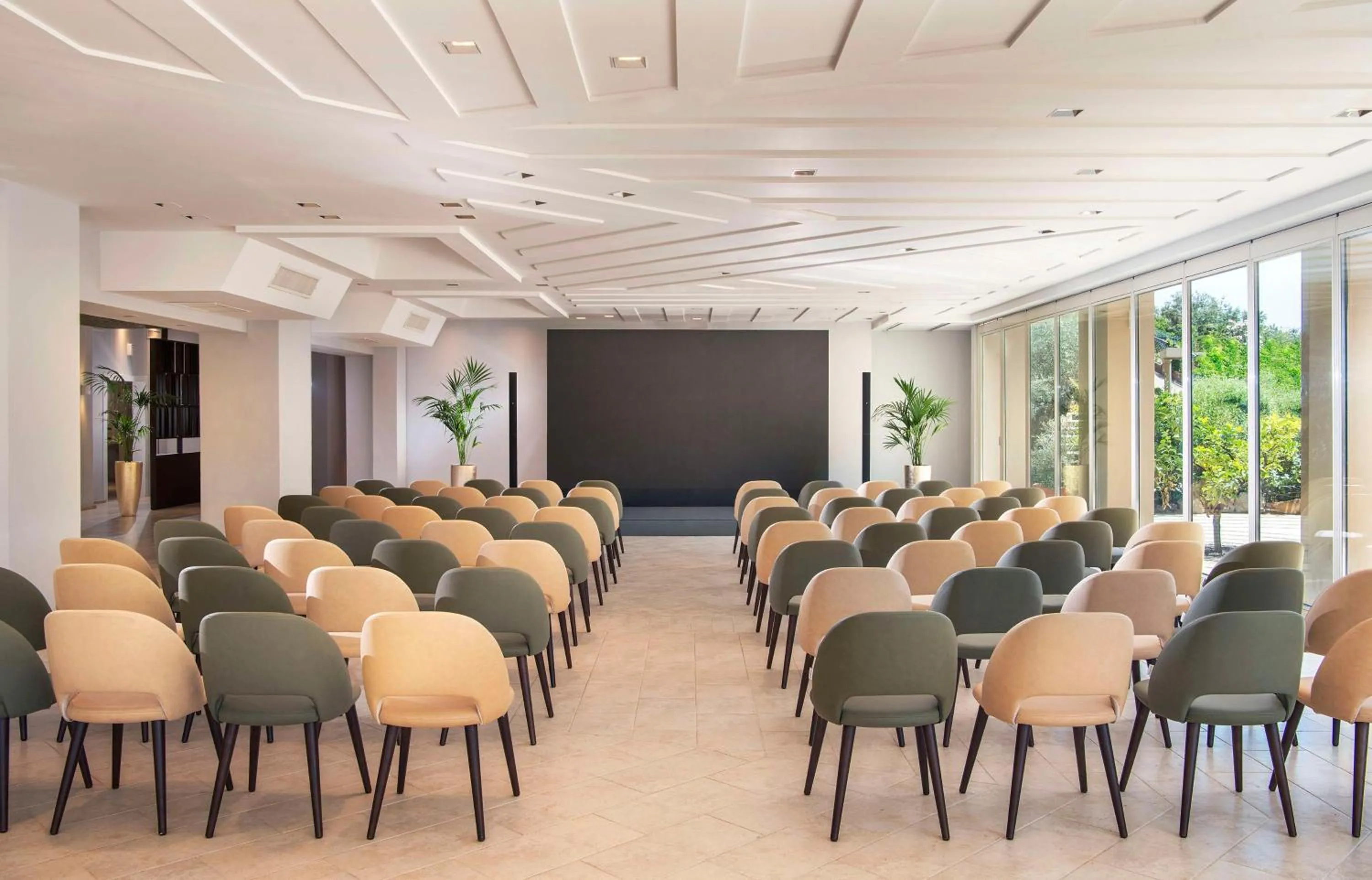 Meeting/conference room in Baia Di Chia Resort Sardinia, Curio Collection By Hilton