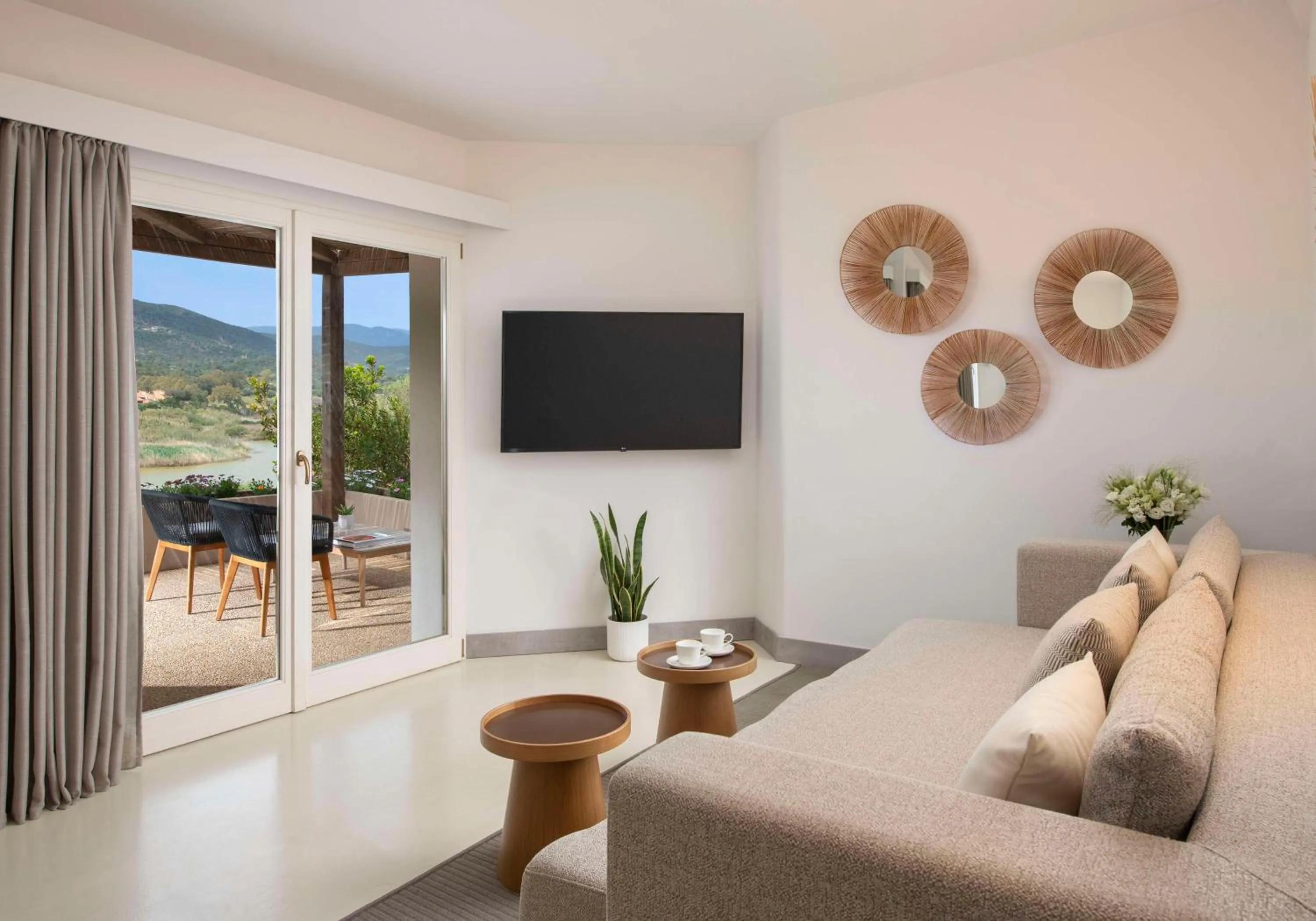 Bedroom in Baia Di Chia Resort Sardinia, Curio Collection By Hilton