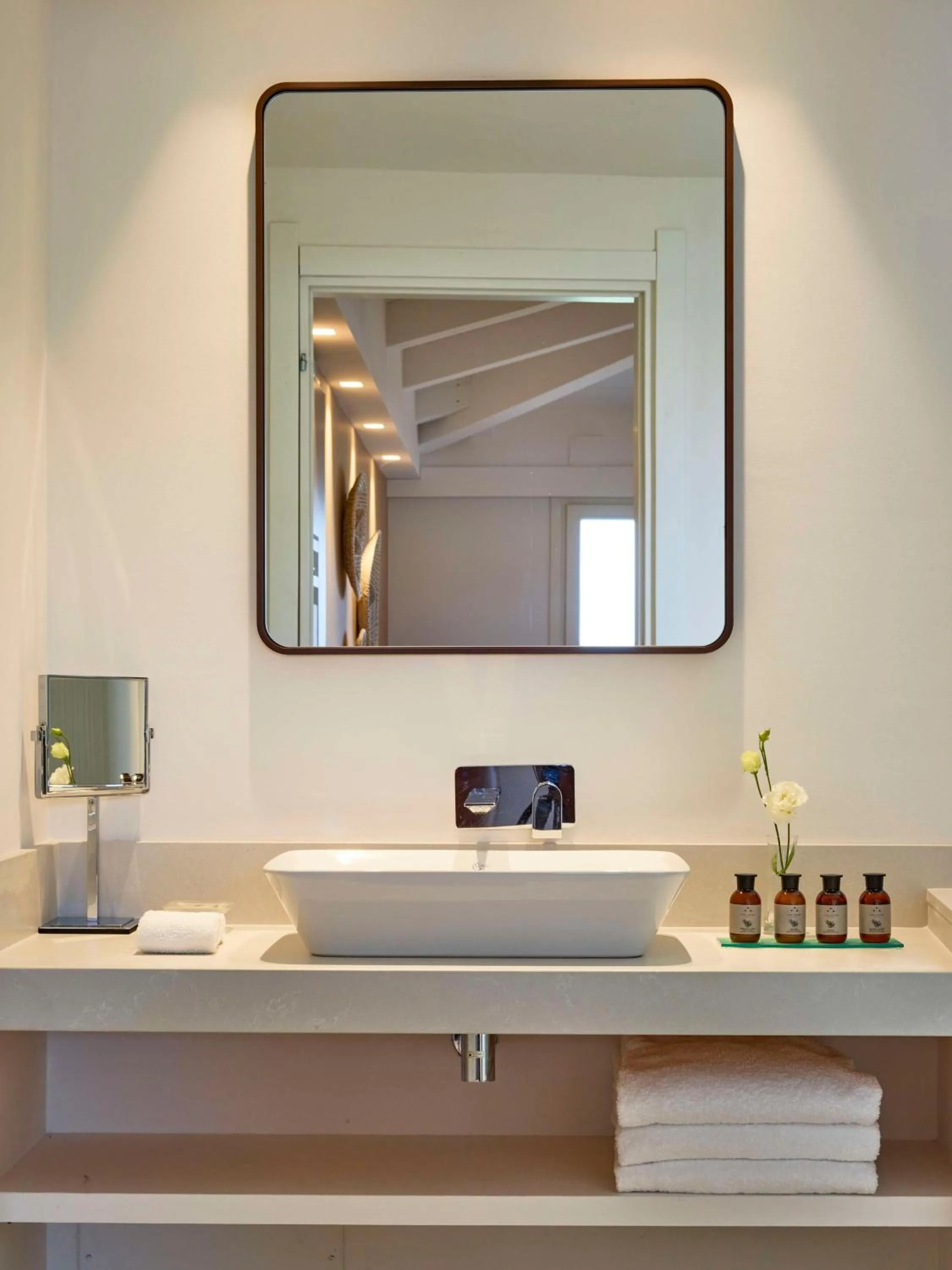Bathroom in Baia Di Chia Resort Sardinia, Curio Collection By Hilton
