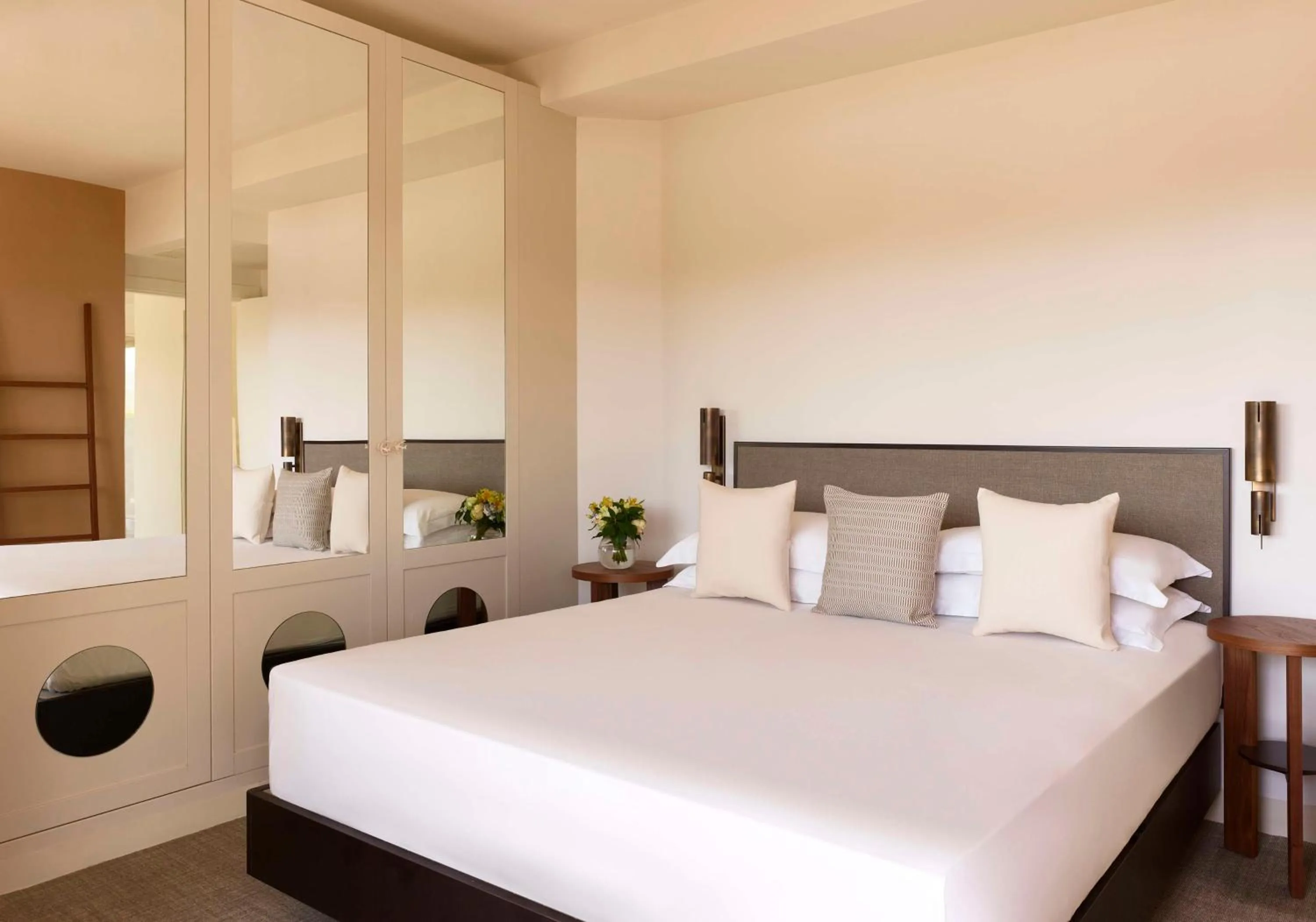 Bed in Baia Di Chia Resort Sardinia, Curio Collection By Hilton