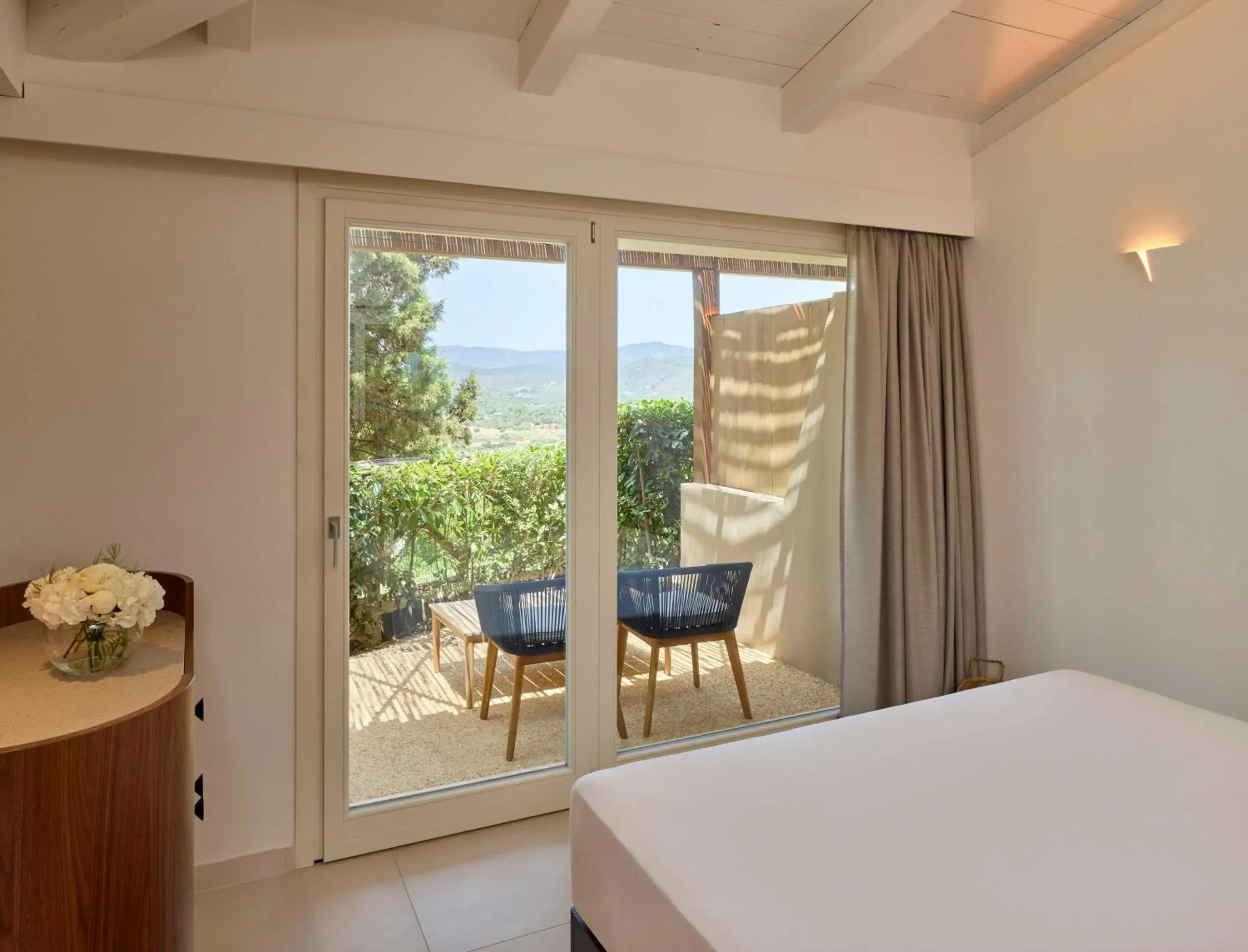Bed in Baia Di Chia Resort Sardinia, Curio Collection By Hilton Bed in Baia Di Chia Resort Sardinia, Curio Collection By Hilton
