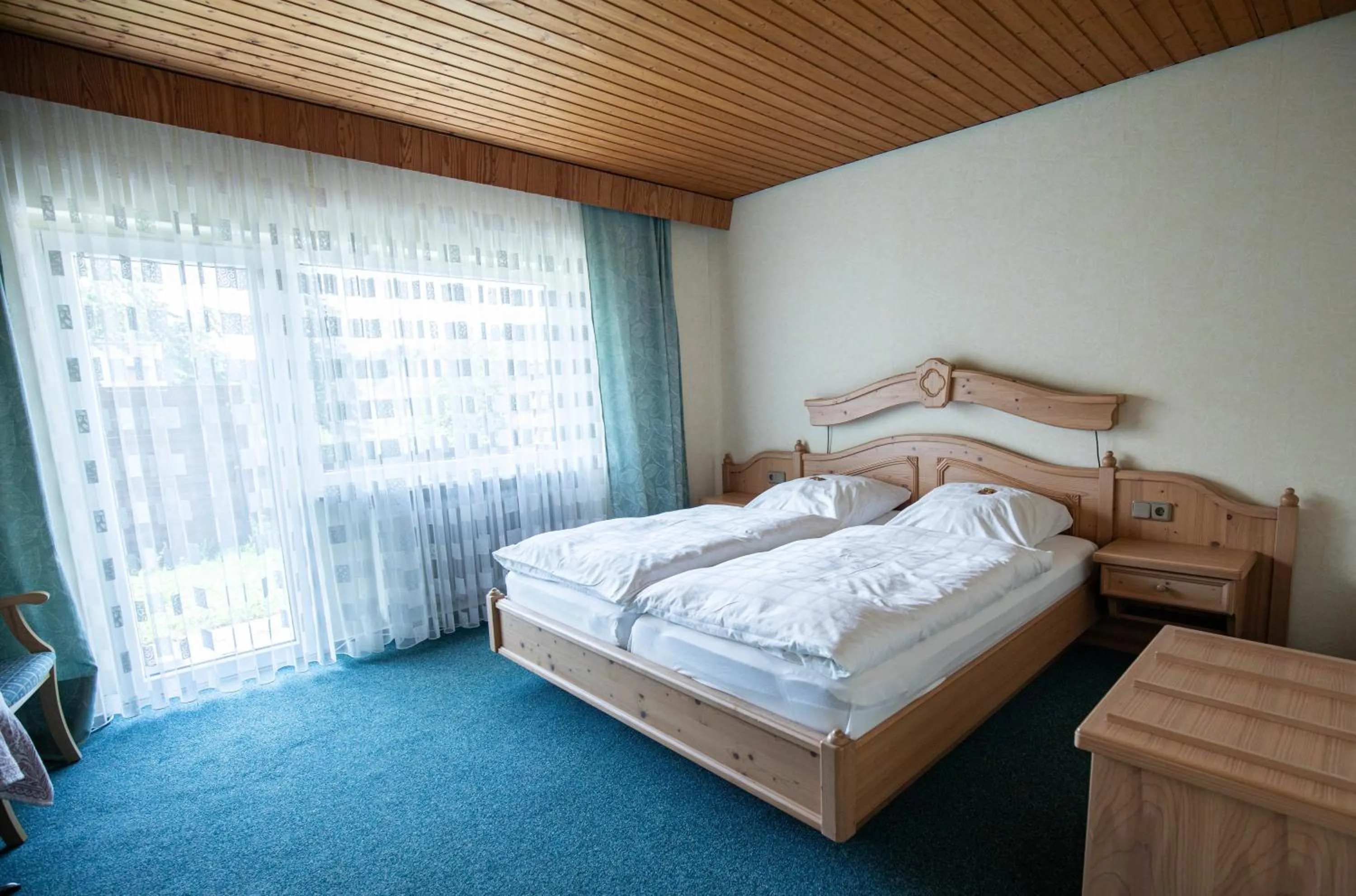 Photo of the whole room, Bed in Landhotel Jägerhof
