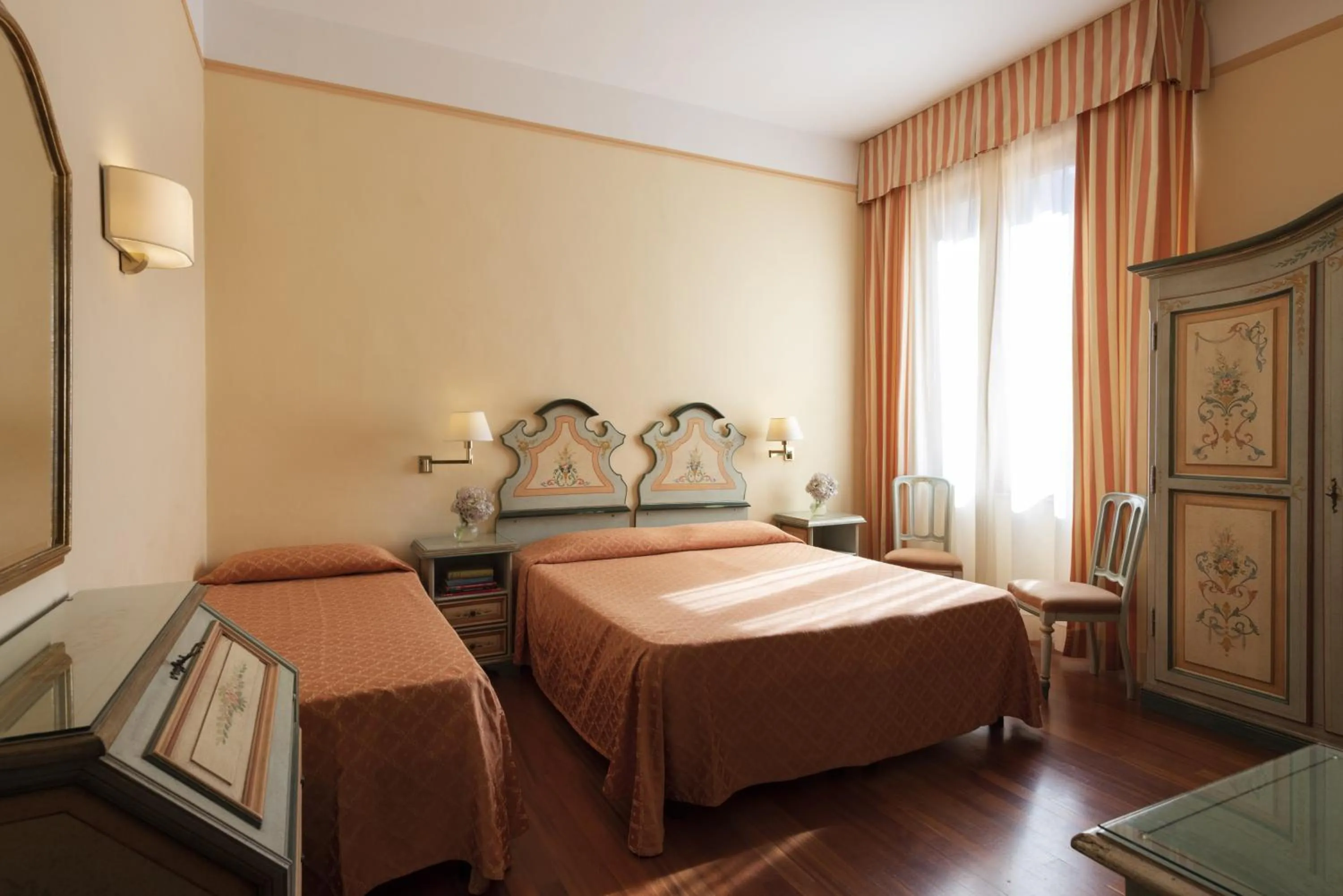 Bed in Hotel Parma e Oriente Wellness & Spa