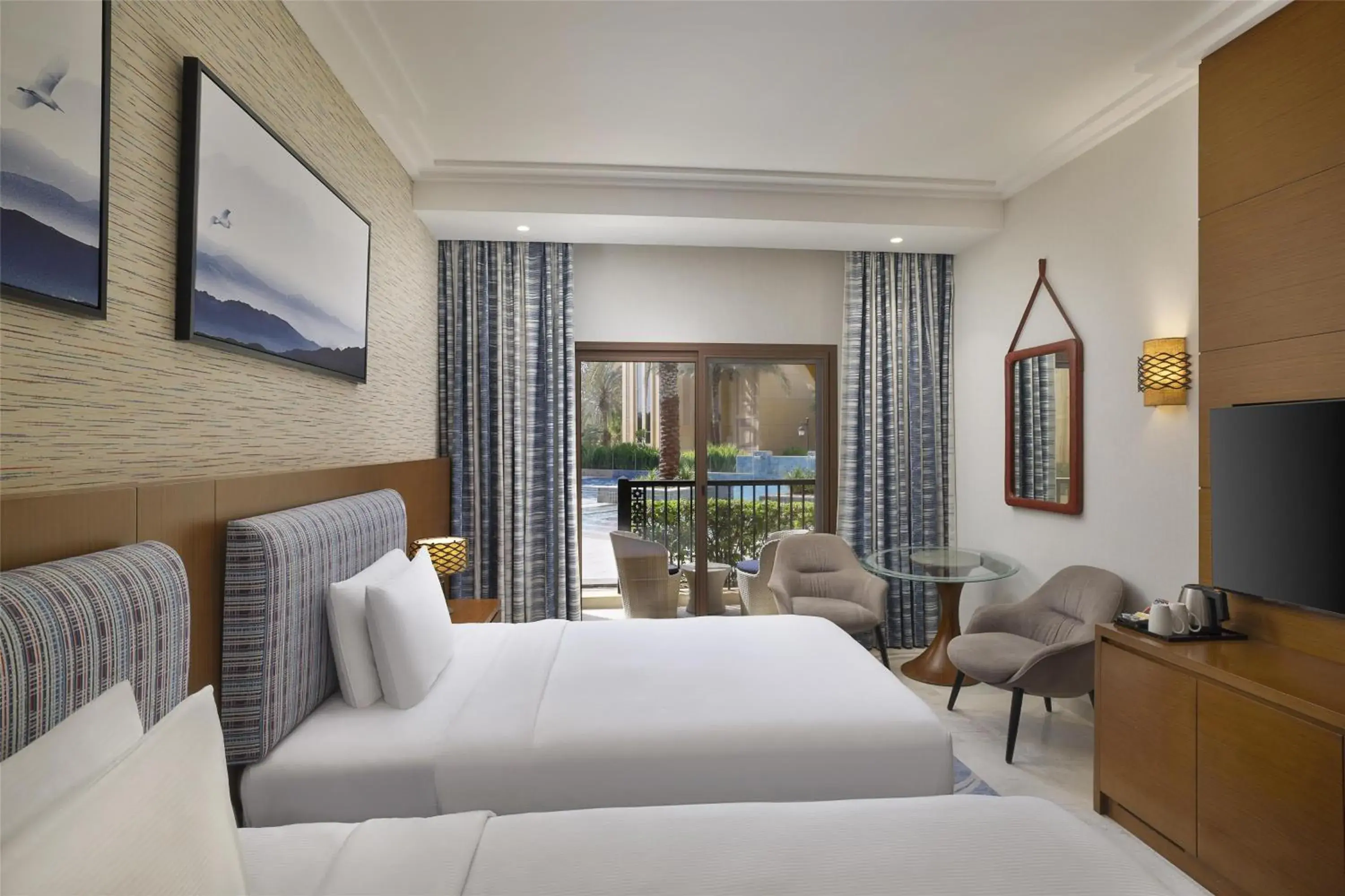 Twin Guest Room with Balcony in DoubleTree by Hilton Resort & Spa Marjan Island Twin Guest Room with Balcony in DoubleTree by Hilton Resort & Spa Marjan Island