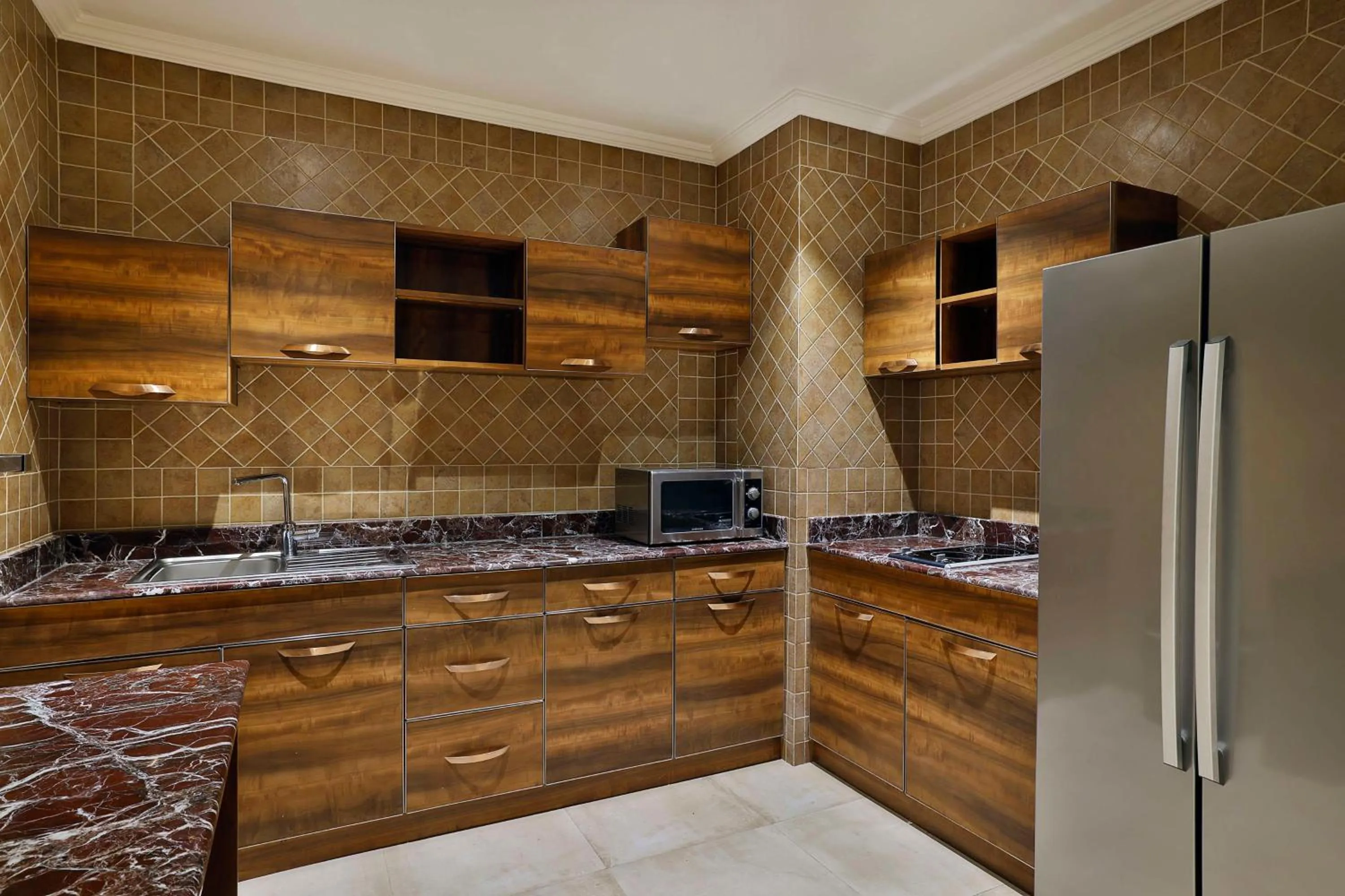 Kitchen or kitchenette in DoubleTree by Hilton Resort & Spa Marjan Island