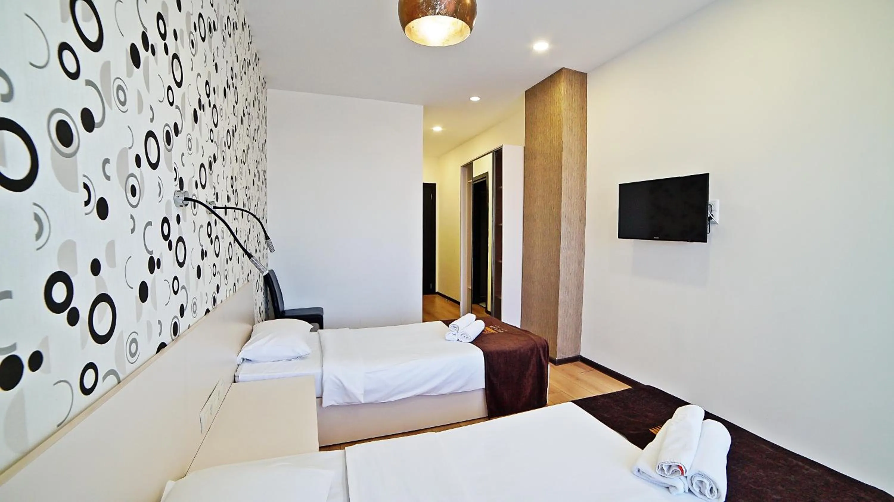 Bed in Mardi Plaza Hotel