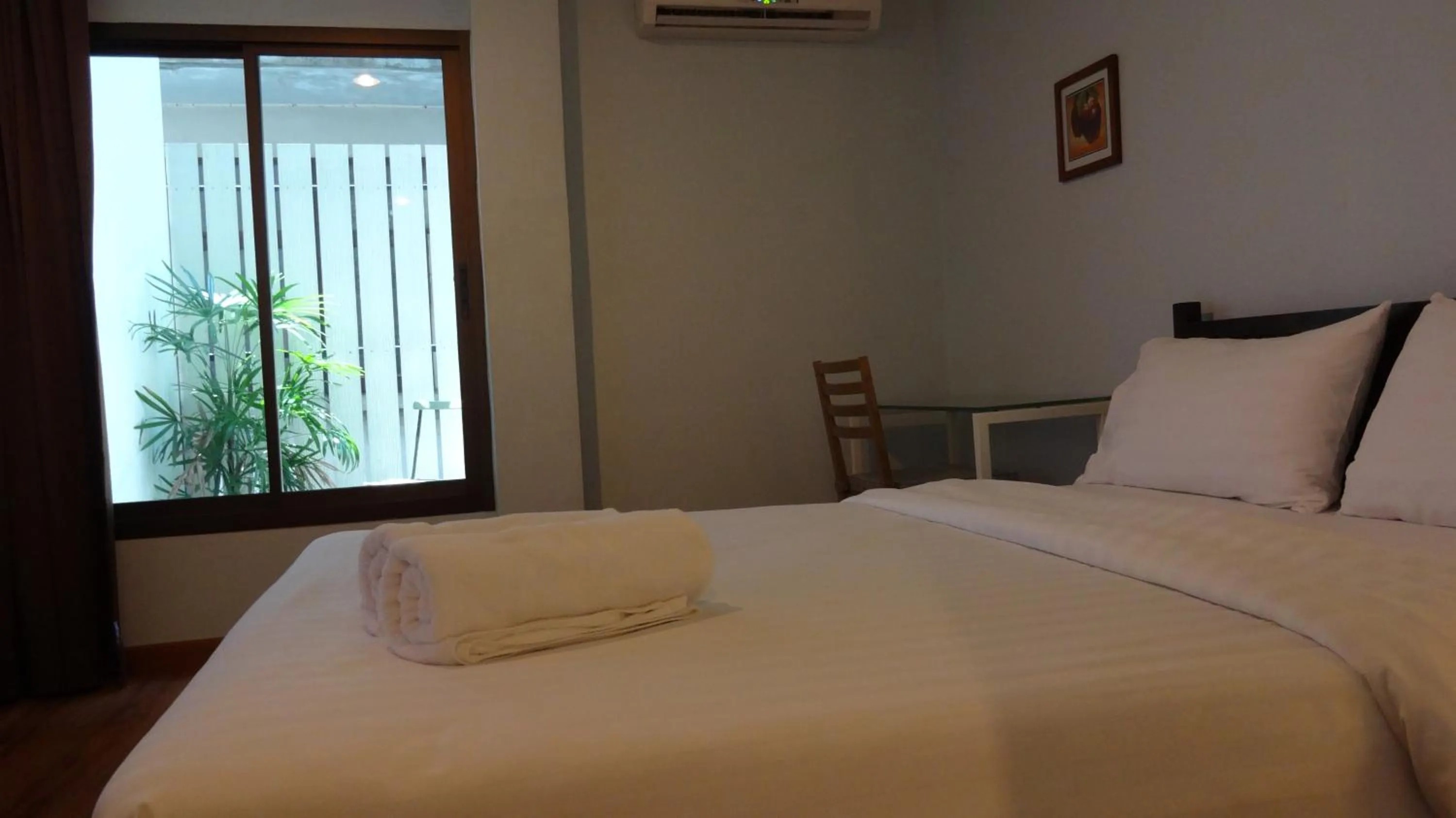 Bed in Mango Bedroom Inn