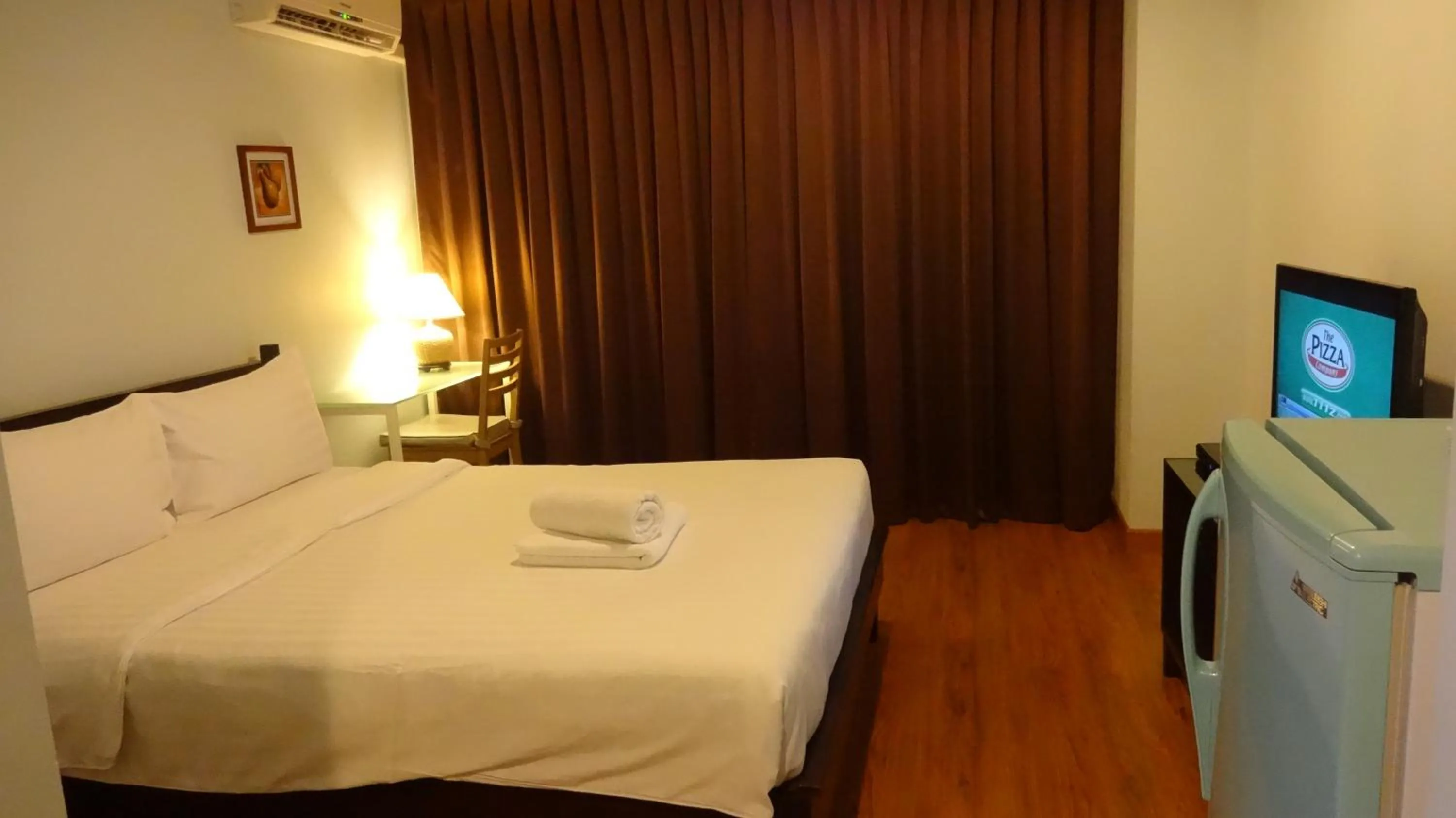 Bed in Mango Bedroom Inn