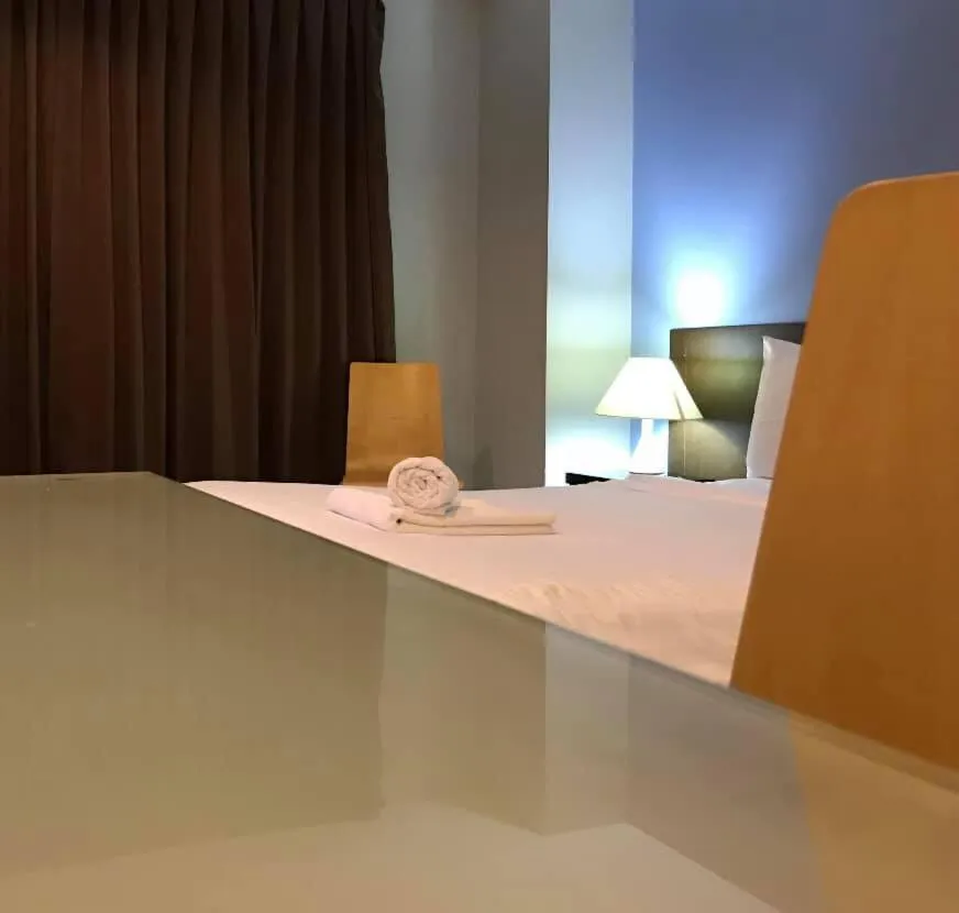 Bed in Mango Bedroom Inn