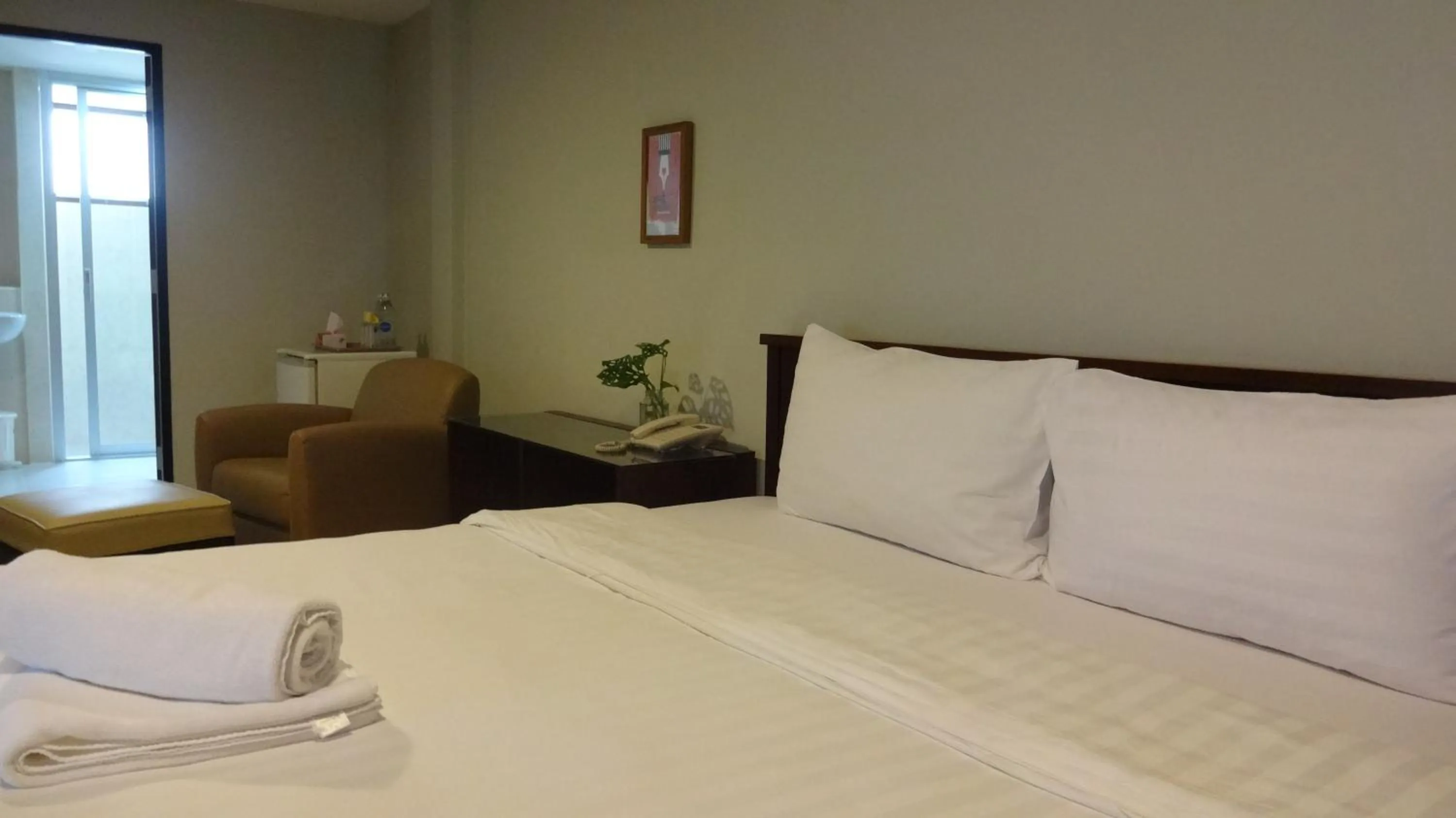 Bed in Mango Bedroom Inn