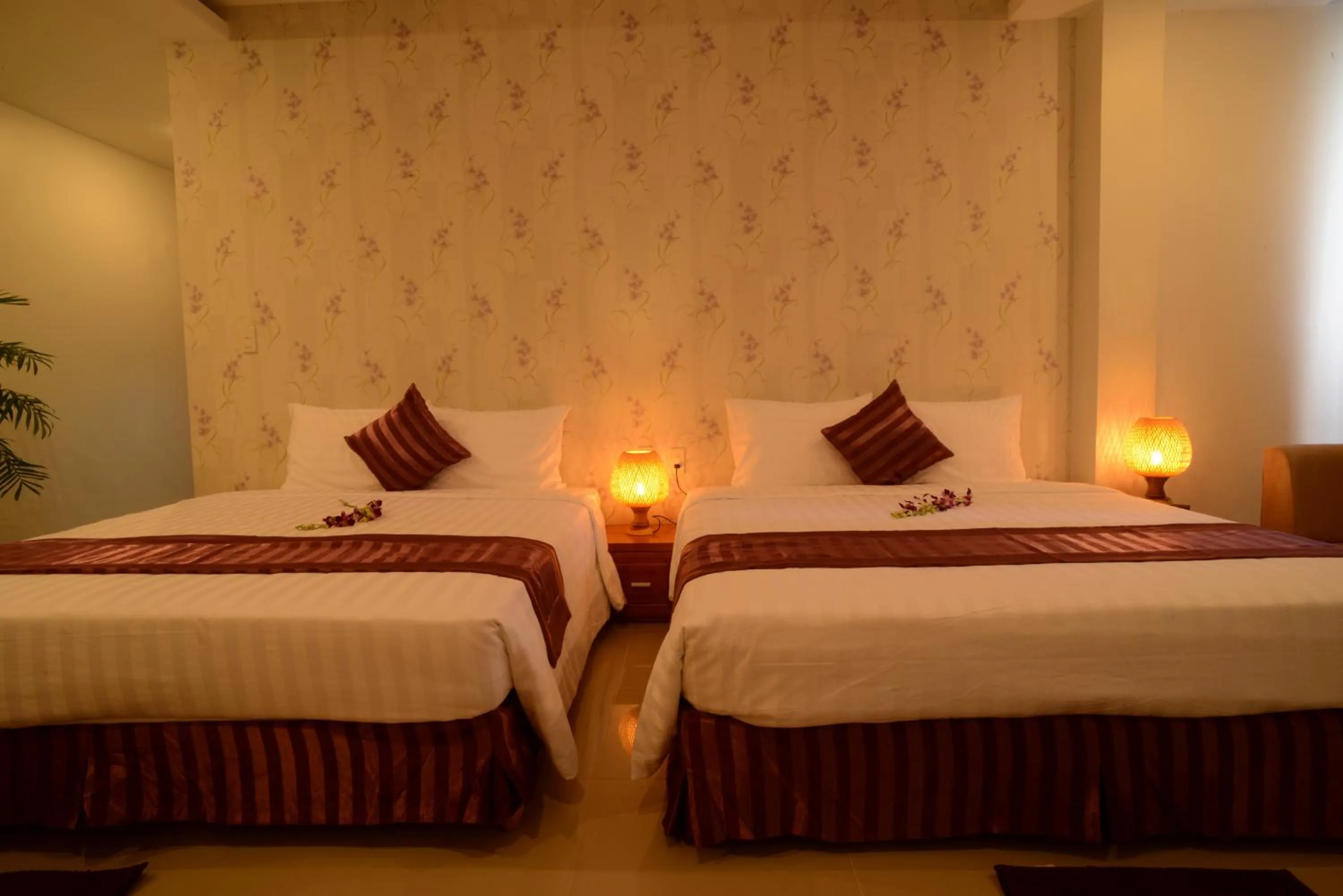 Bed in Lien Do Star Hotel