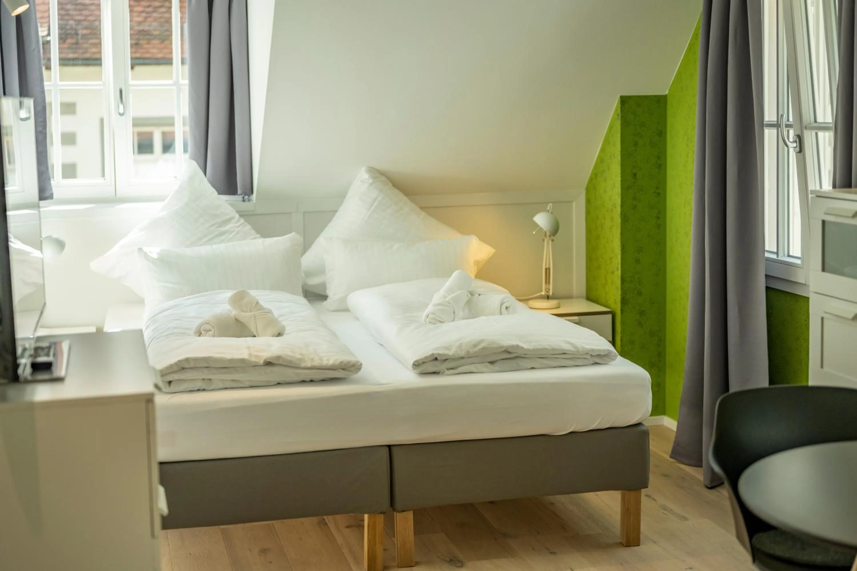 Bed in Gästehaus am Schlossplatz, Z. 4