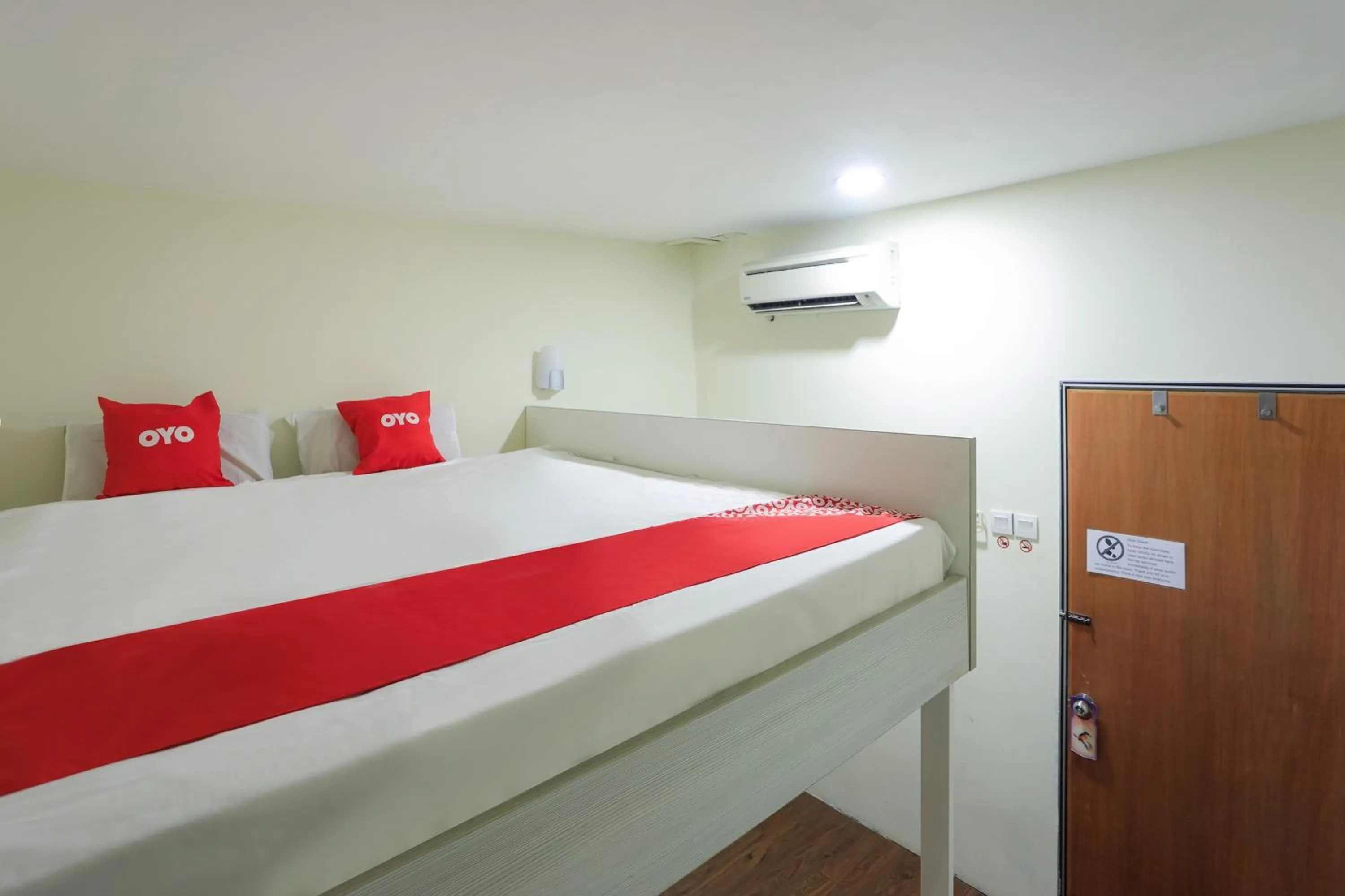 Bedroom in SPOT ON 90236 Zigzag Travellers Home