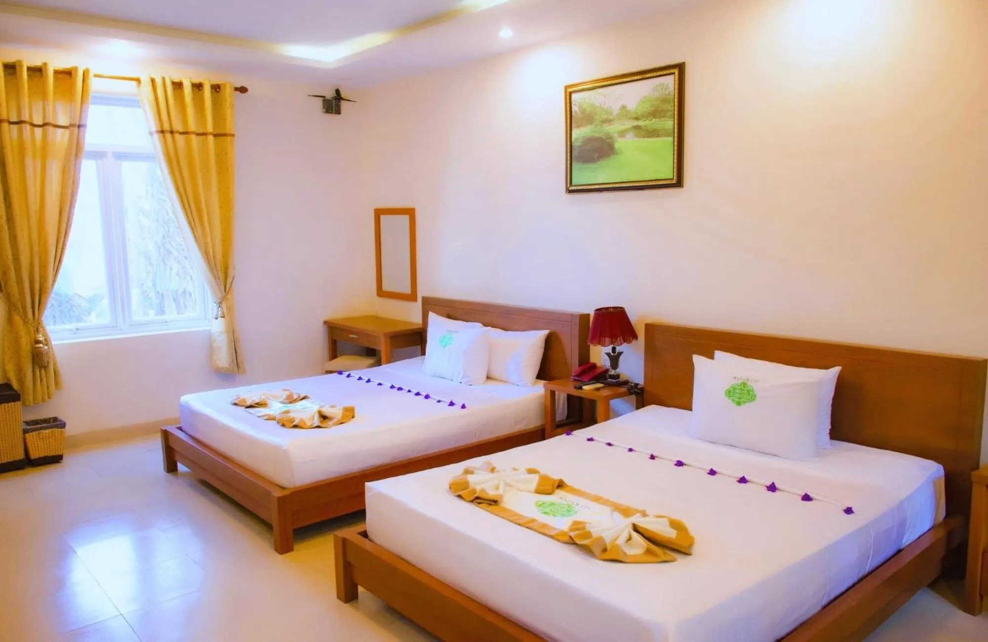 Bed in Saigon Emerald Beach Resort