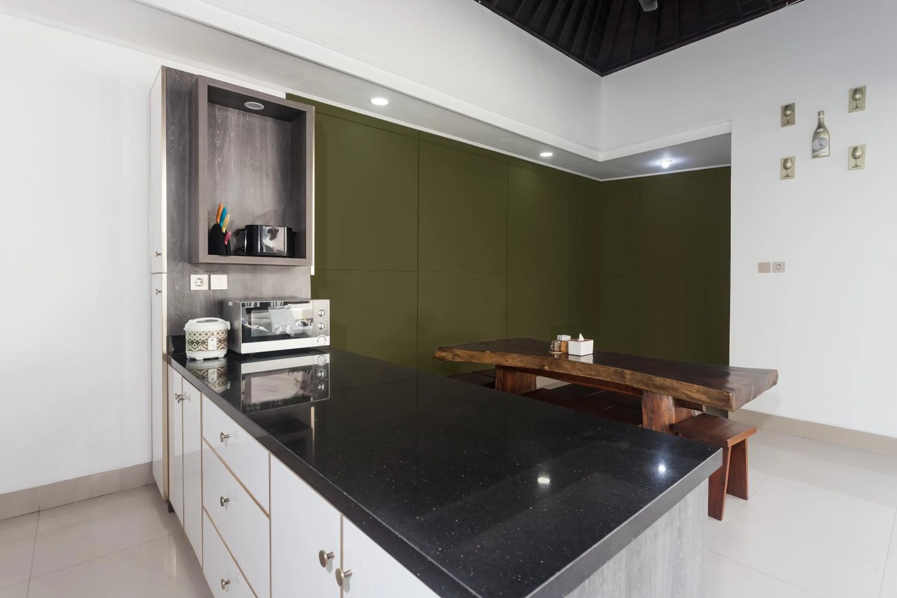 kitchen in Maja Villa Batubelig by GenuineHost