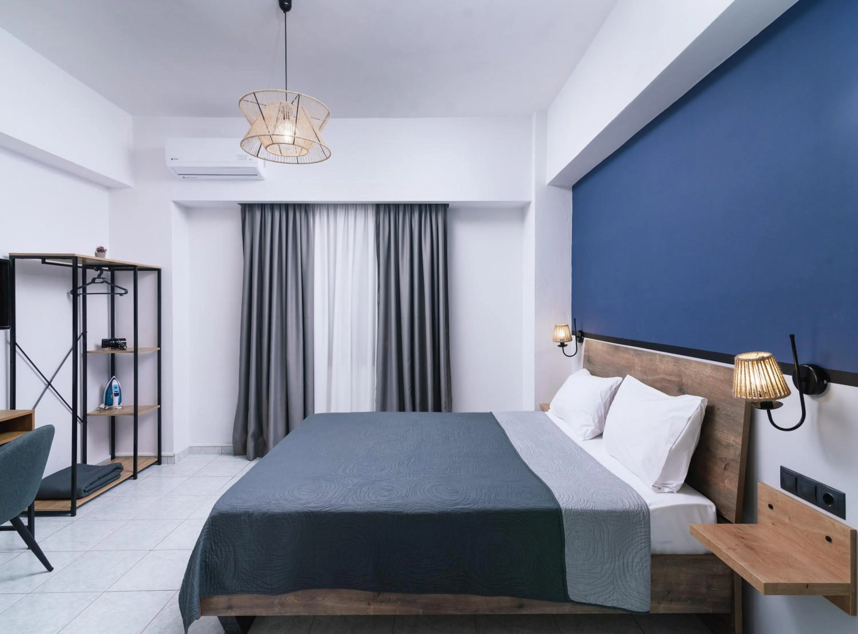 Bed in Alcyone Studios and Apartments