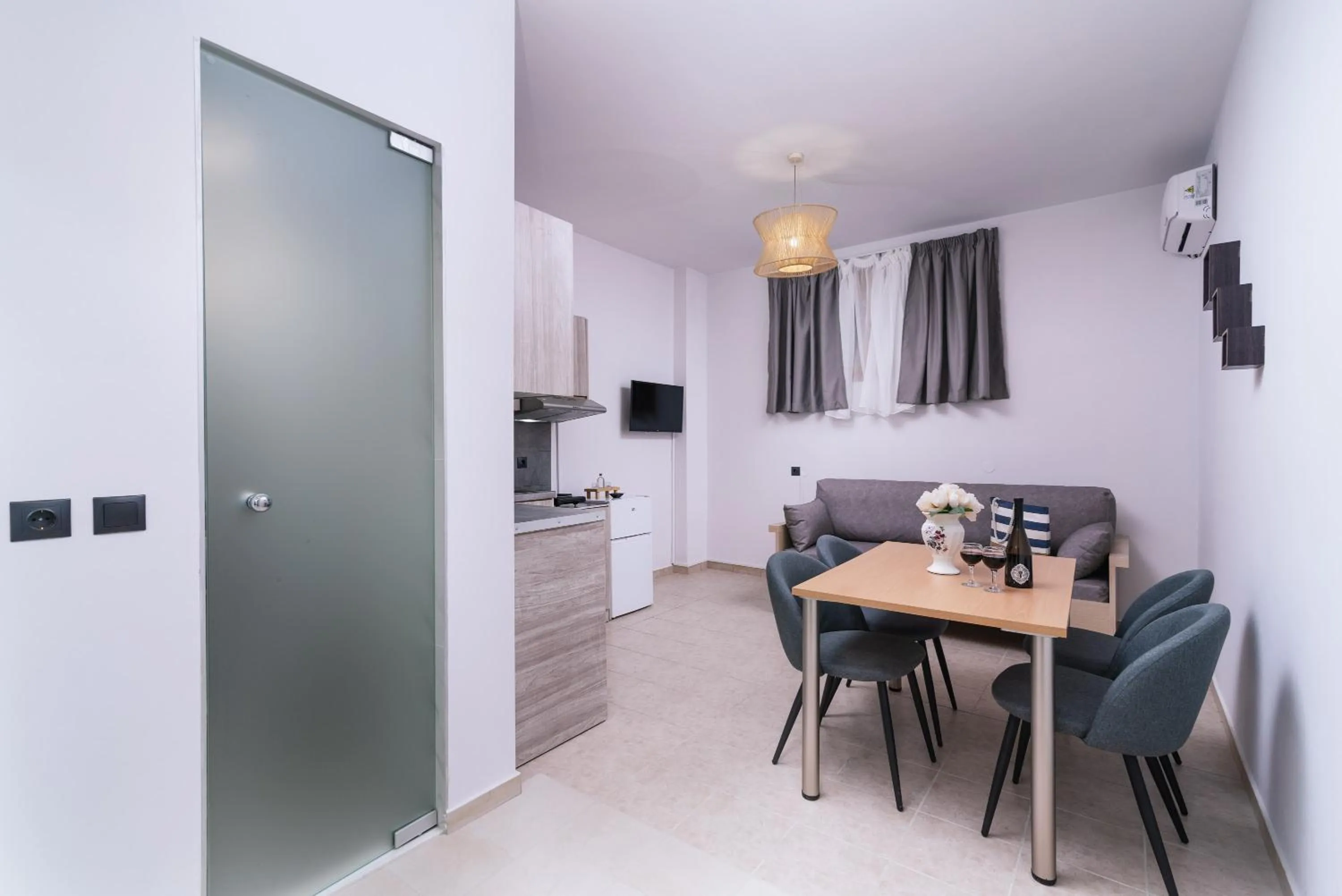 Photo of the whole room in Alcyone Studios and Apartments