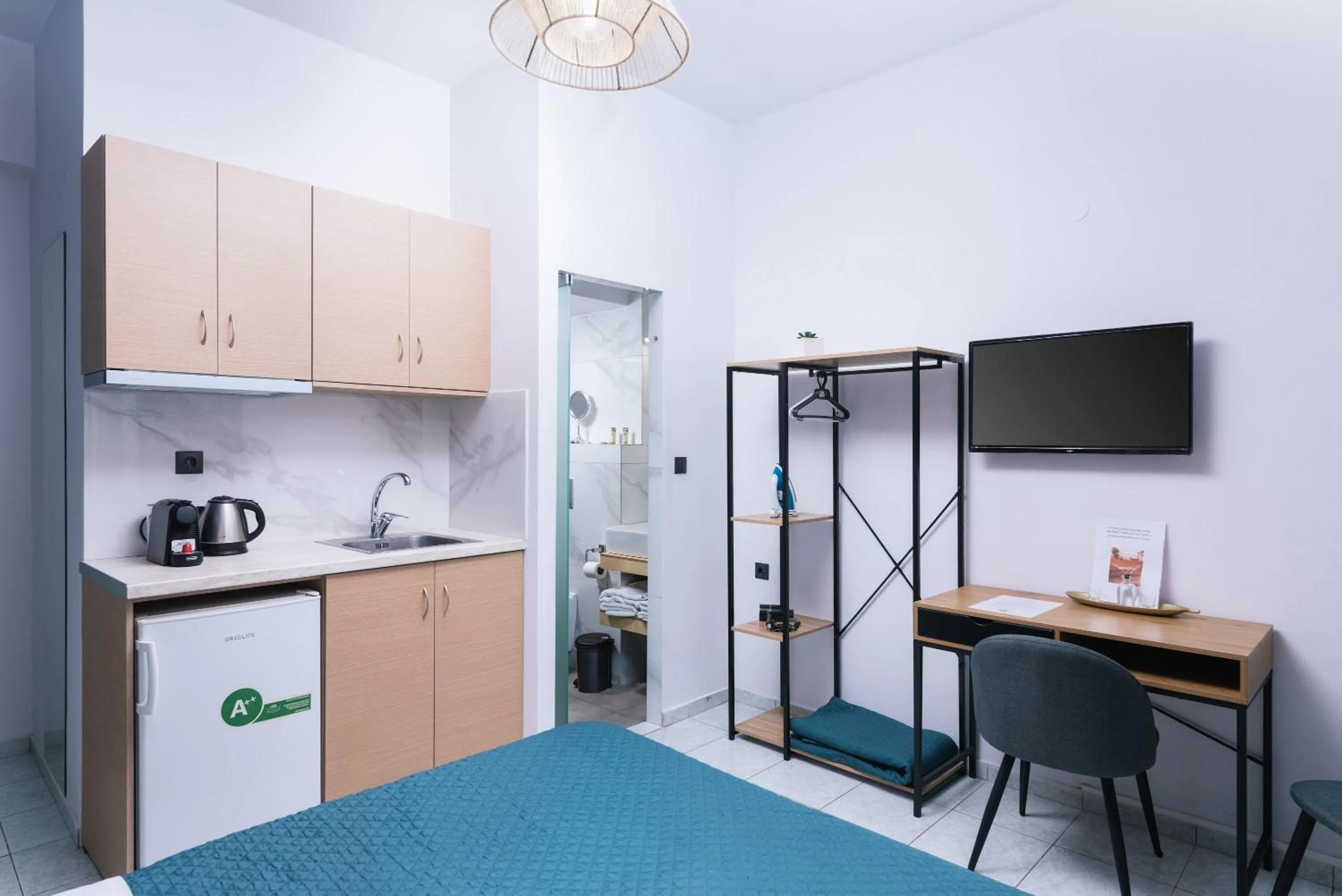 Bed in Alcyone Studios and Apartments