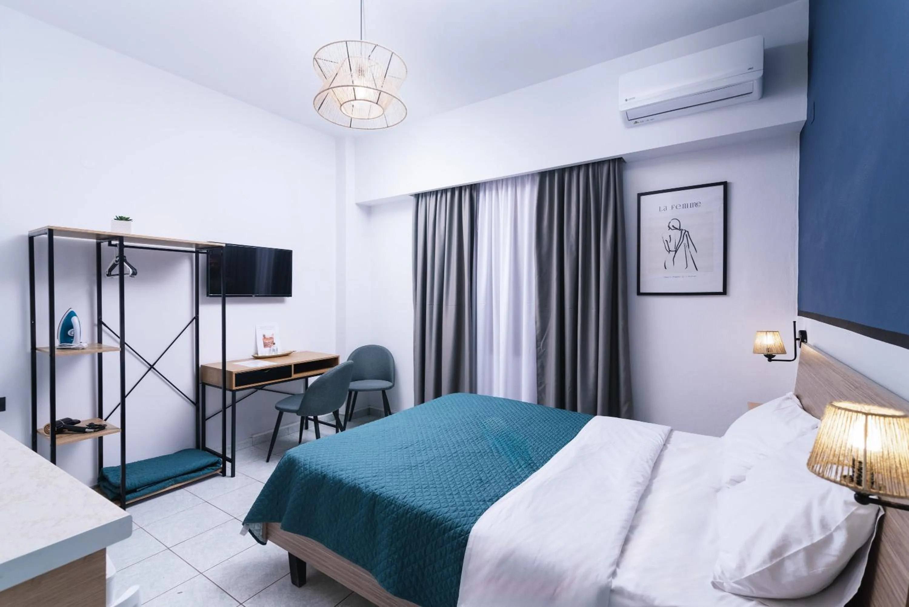 Bed in Alcyone Studios and Apartments