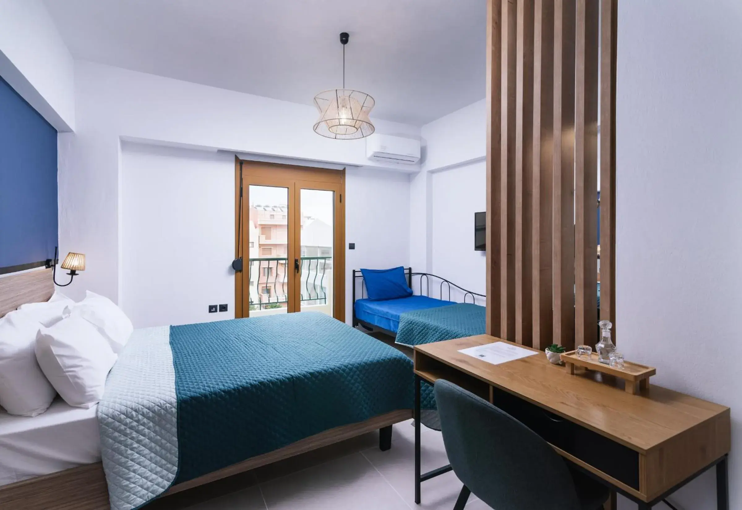 Deluxe Triple Room in Alcyone Studios and Apartments Deluxe Triple Room in Alcyone Studios and Apartments