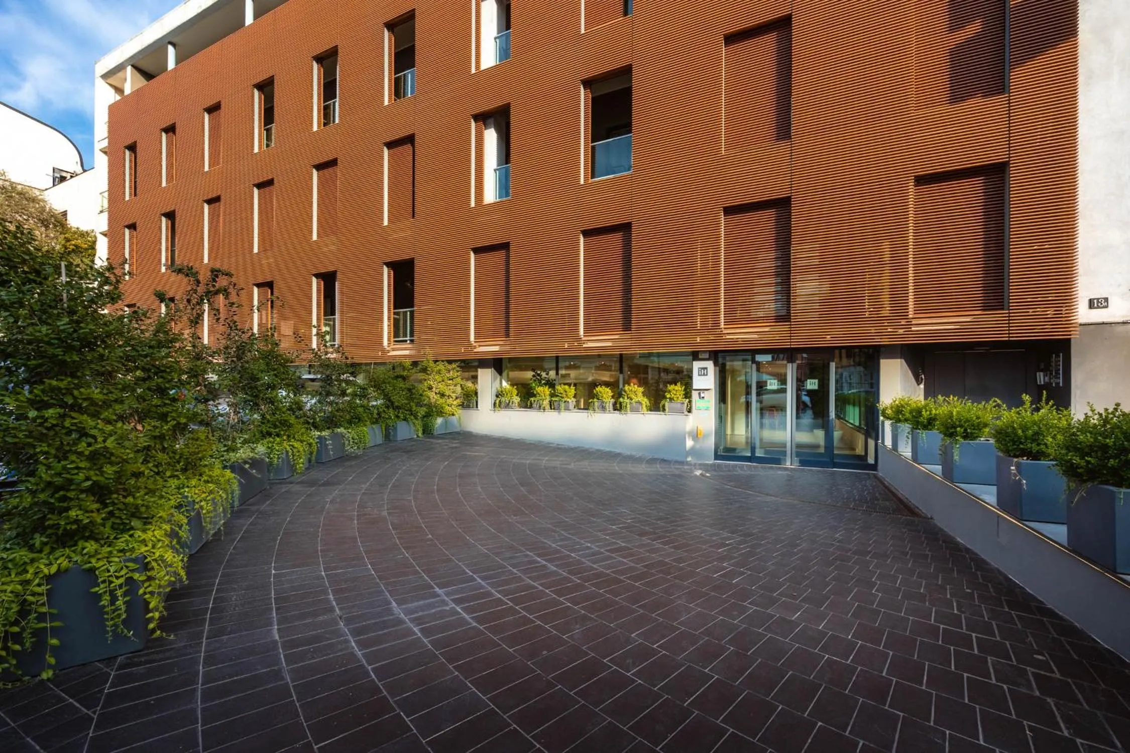 Property building in iH Hotels Milano Watt 13