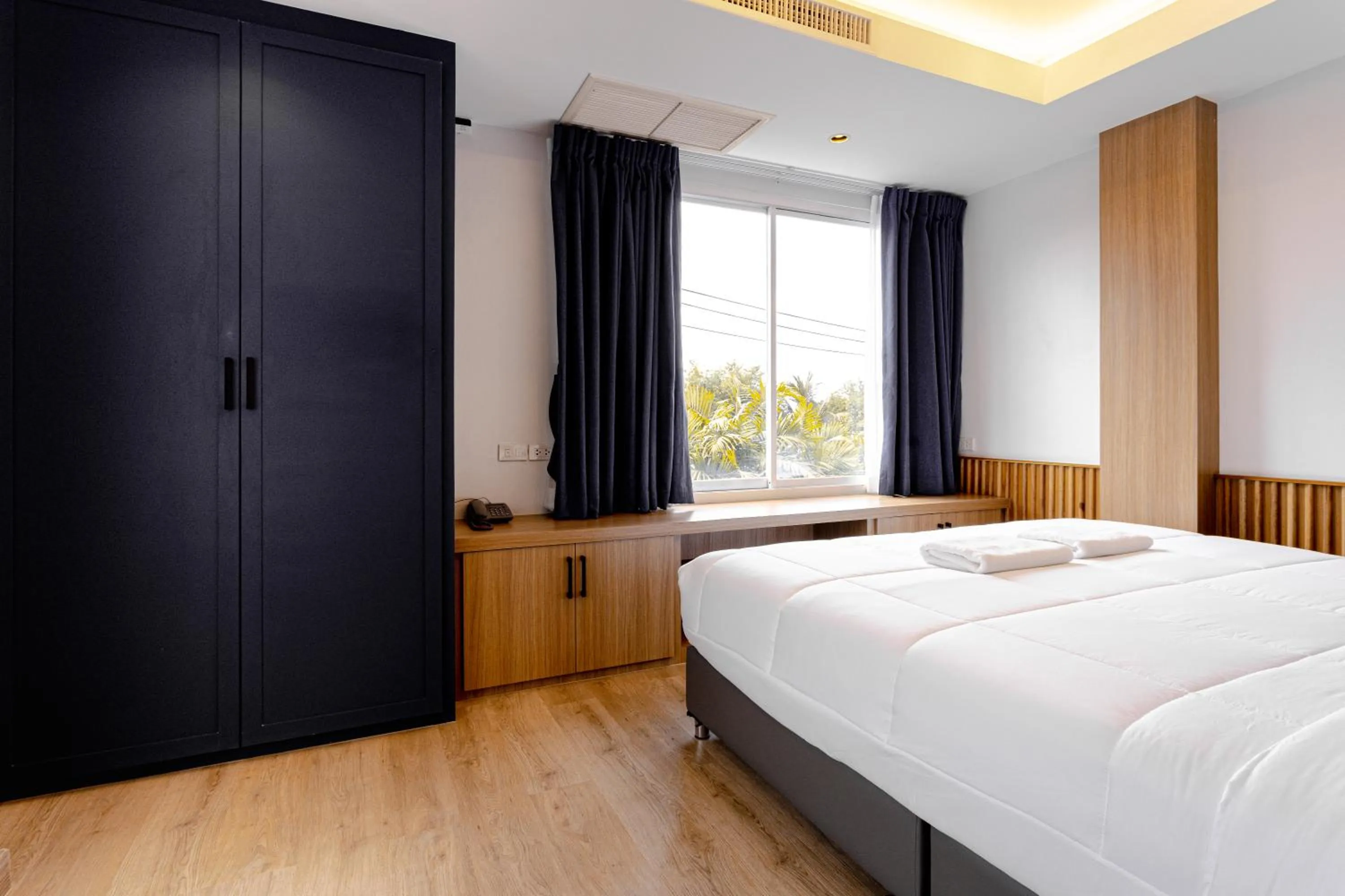 Bed in Nakornping Boutique Hotel