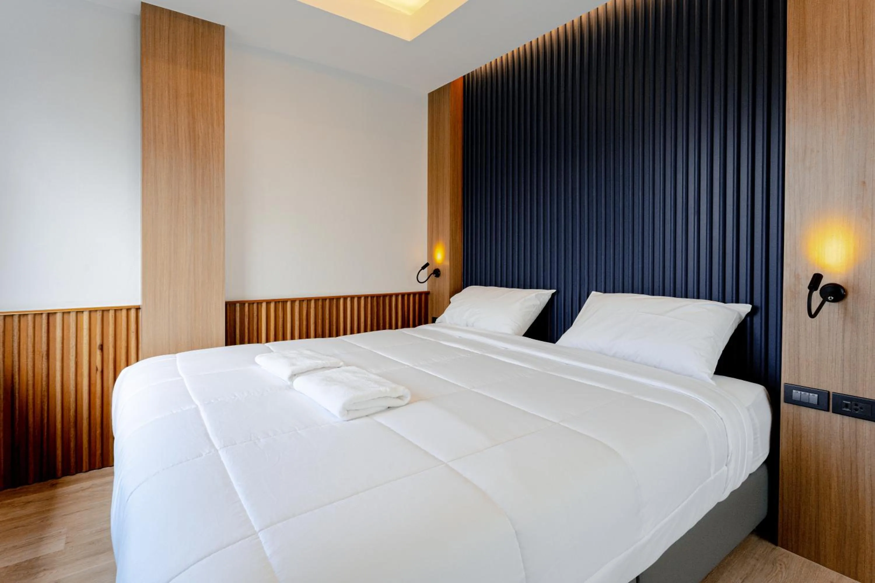 Bed in Nakornping Boutique Hotel