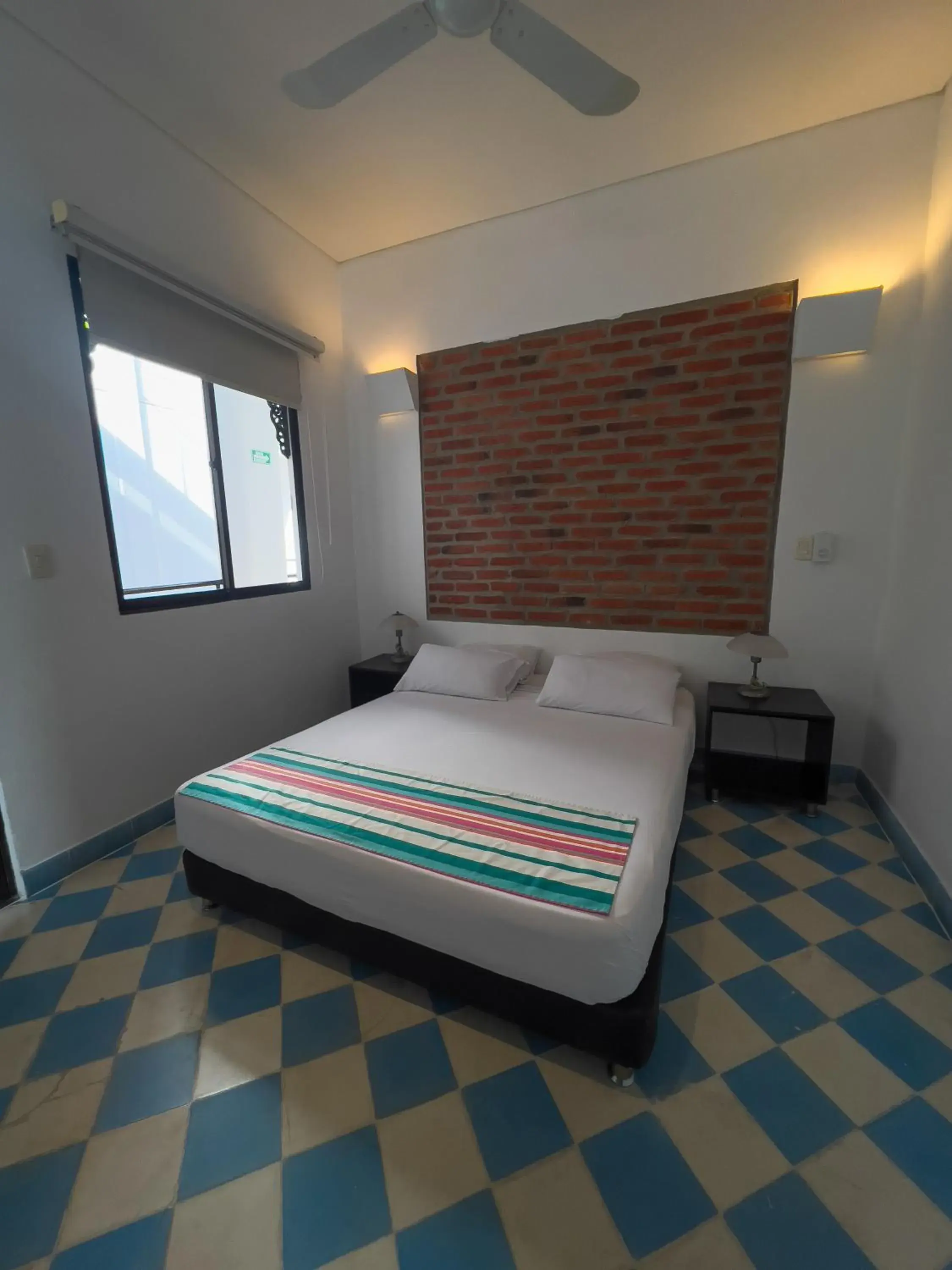 Budget Double Room in The Orange House Santa Marta Budget Double Room in The Orange House Santa Marta