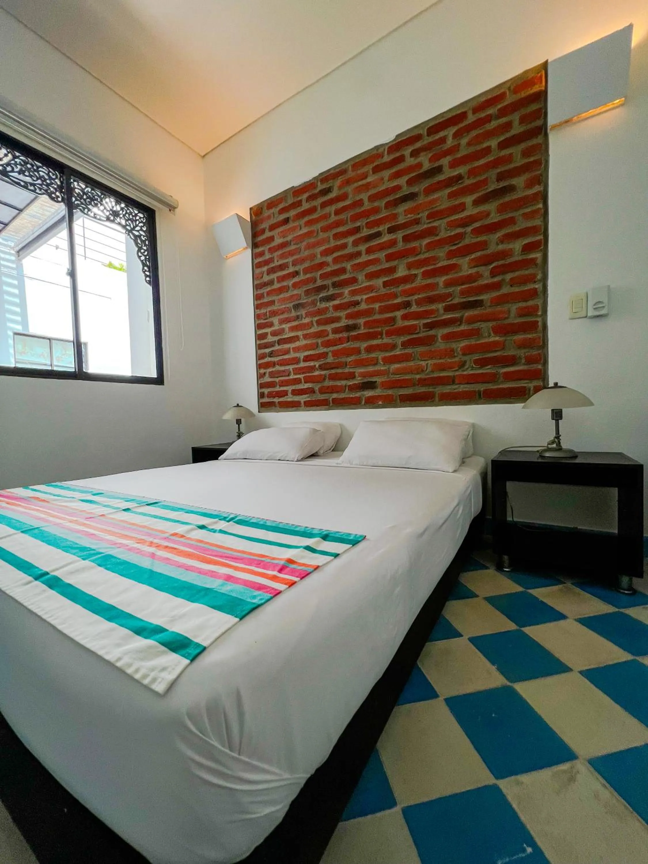 Bed in The Orange House Santa Marta