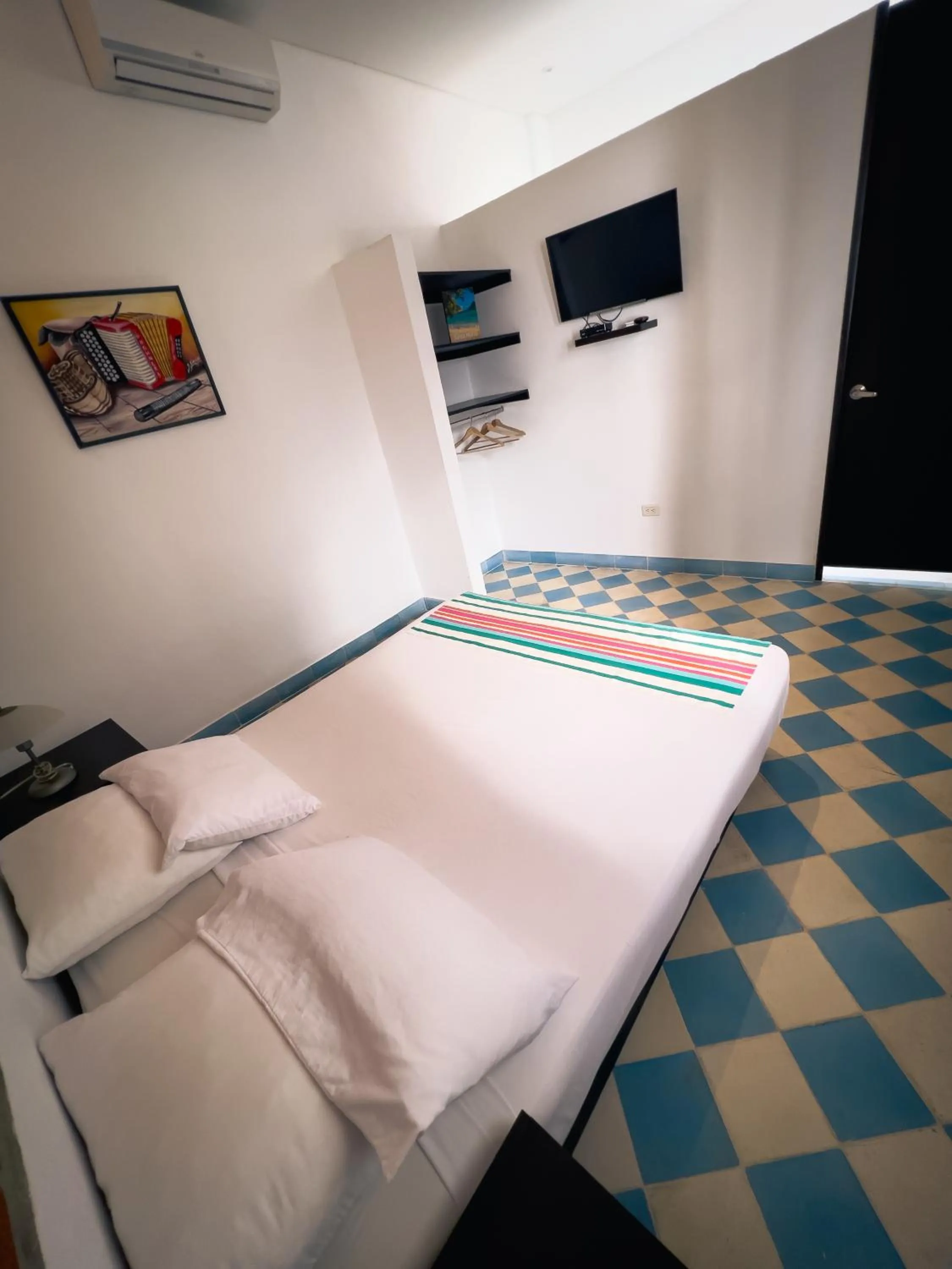 Bed in The Orange House Santa Marta