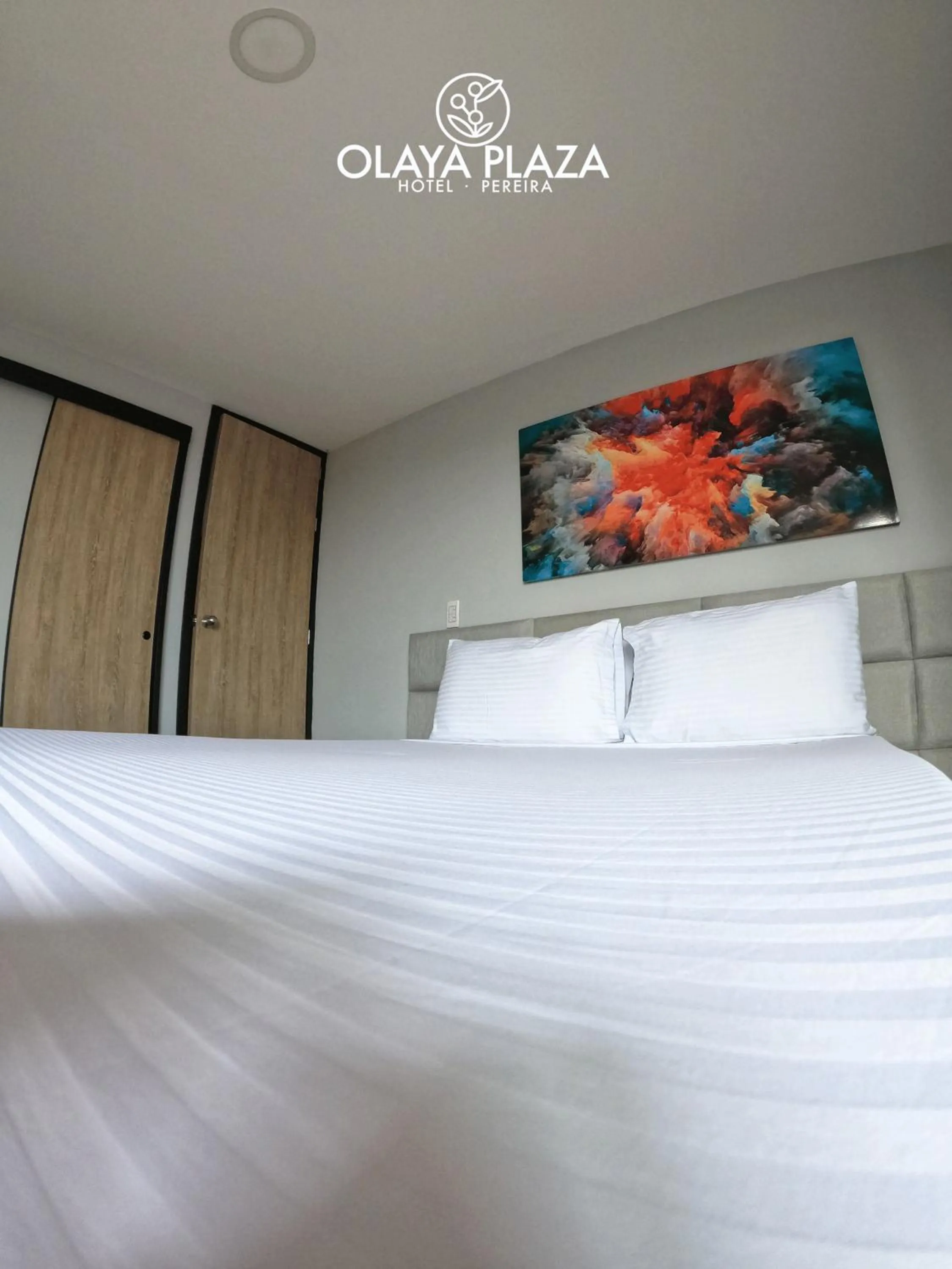 Bed in Hotel Olaya Plaza