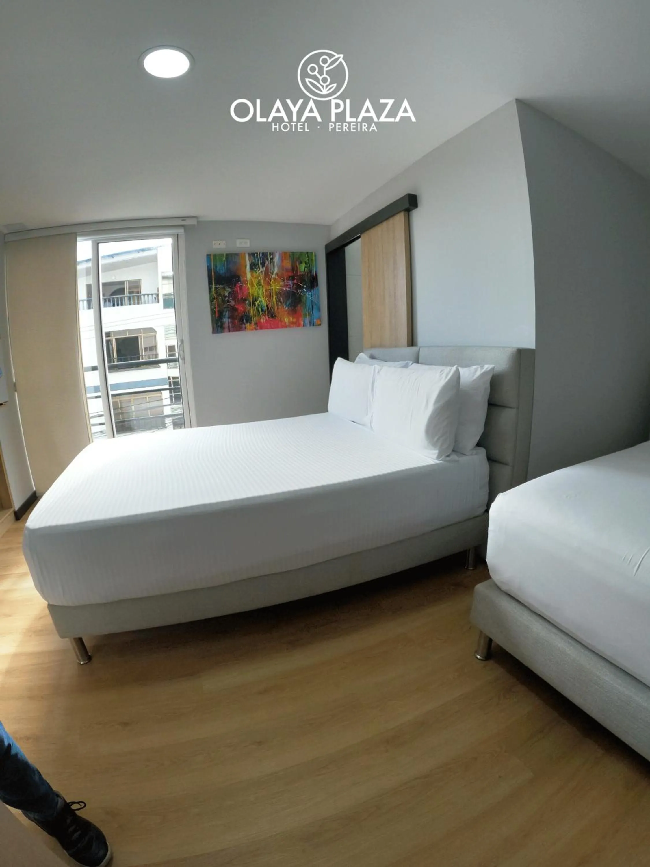 Bed in Hotel Olaya Plaza