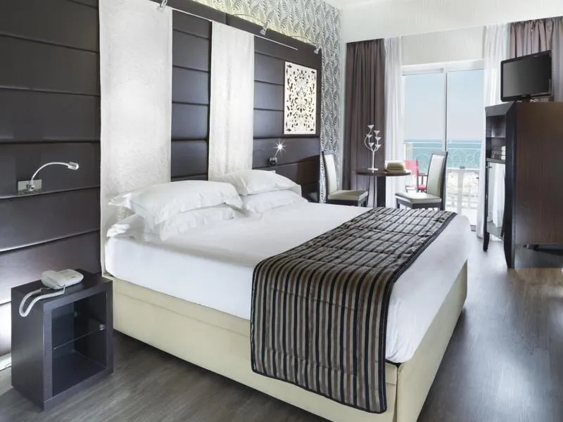 Bedroom, Bed in Hotel Corallo