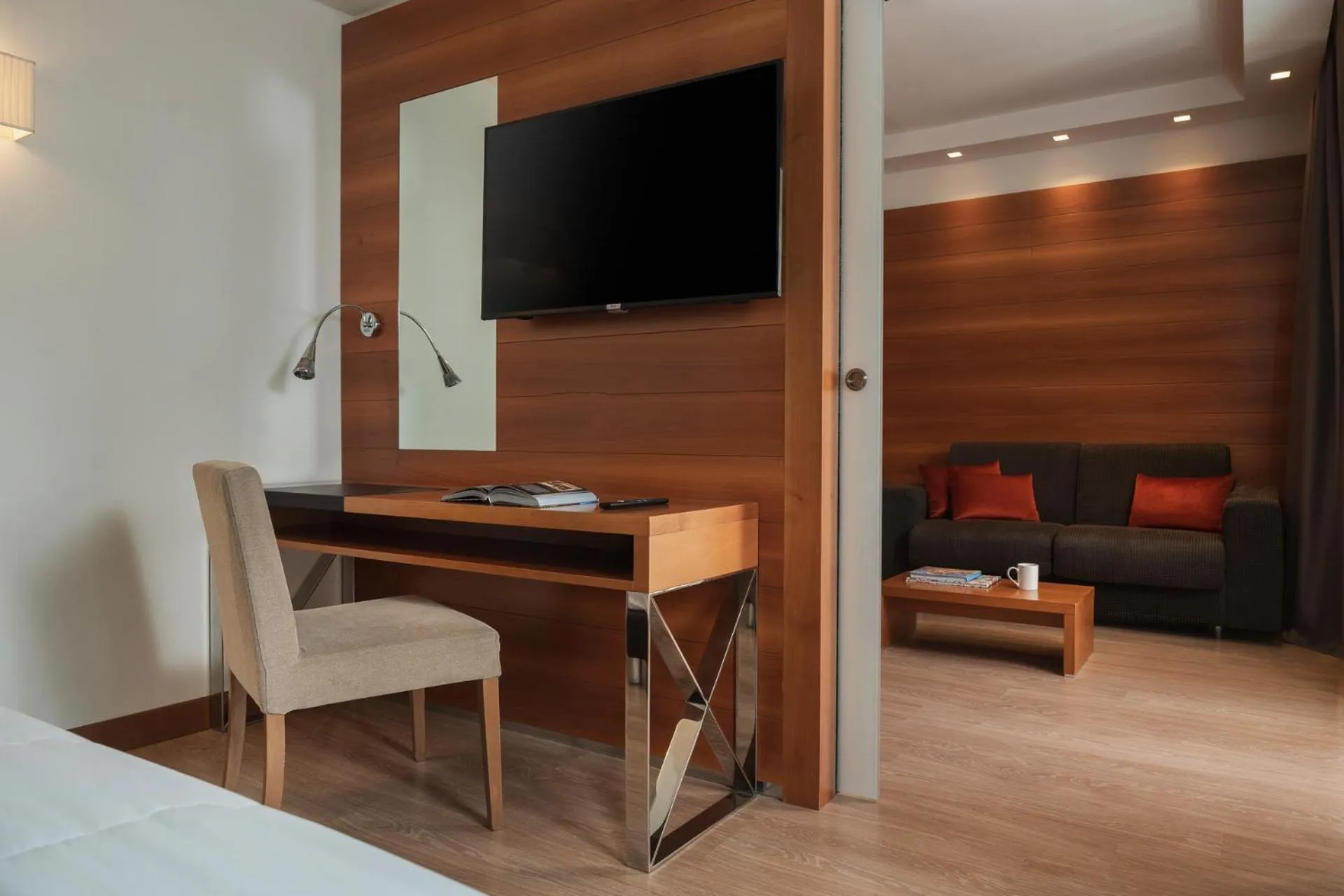 Living room, Bed in Hotel Corallo