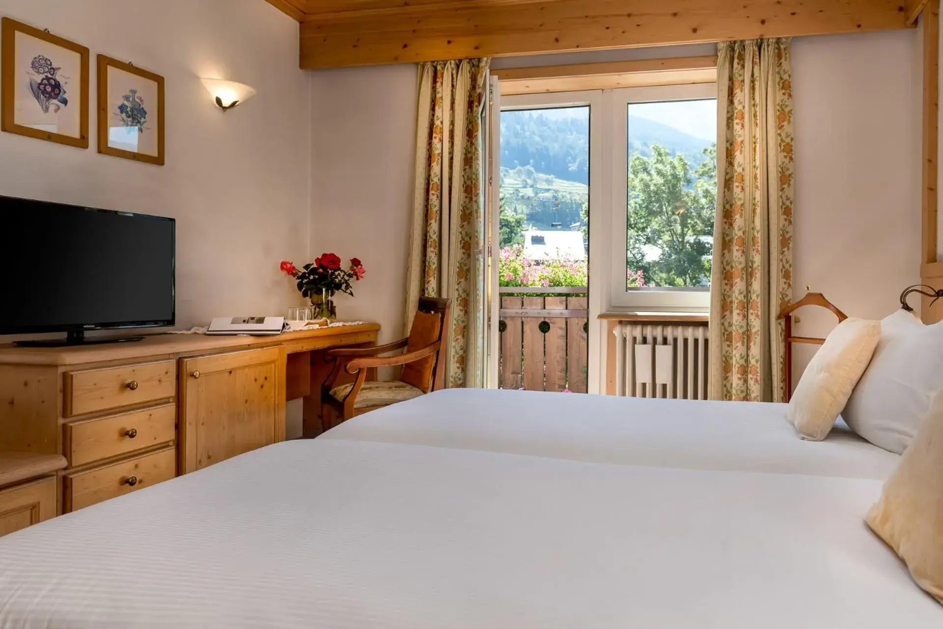 Bed in Hotel Baita Dei Pini Bed in Hotel Baita Dei Pini