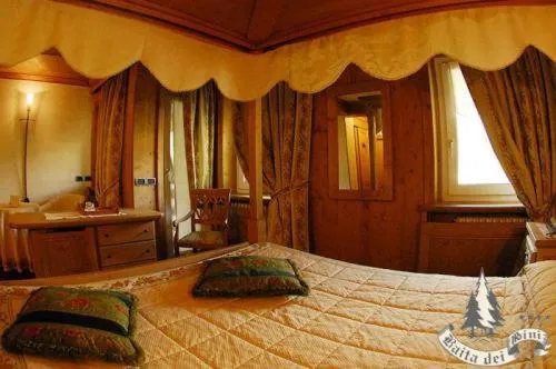 Bedroom, Bed in Hotel Baita Dei Pini
