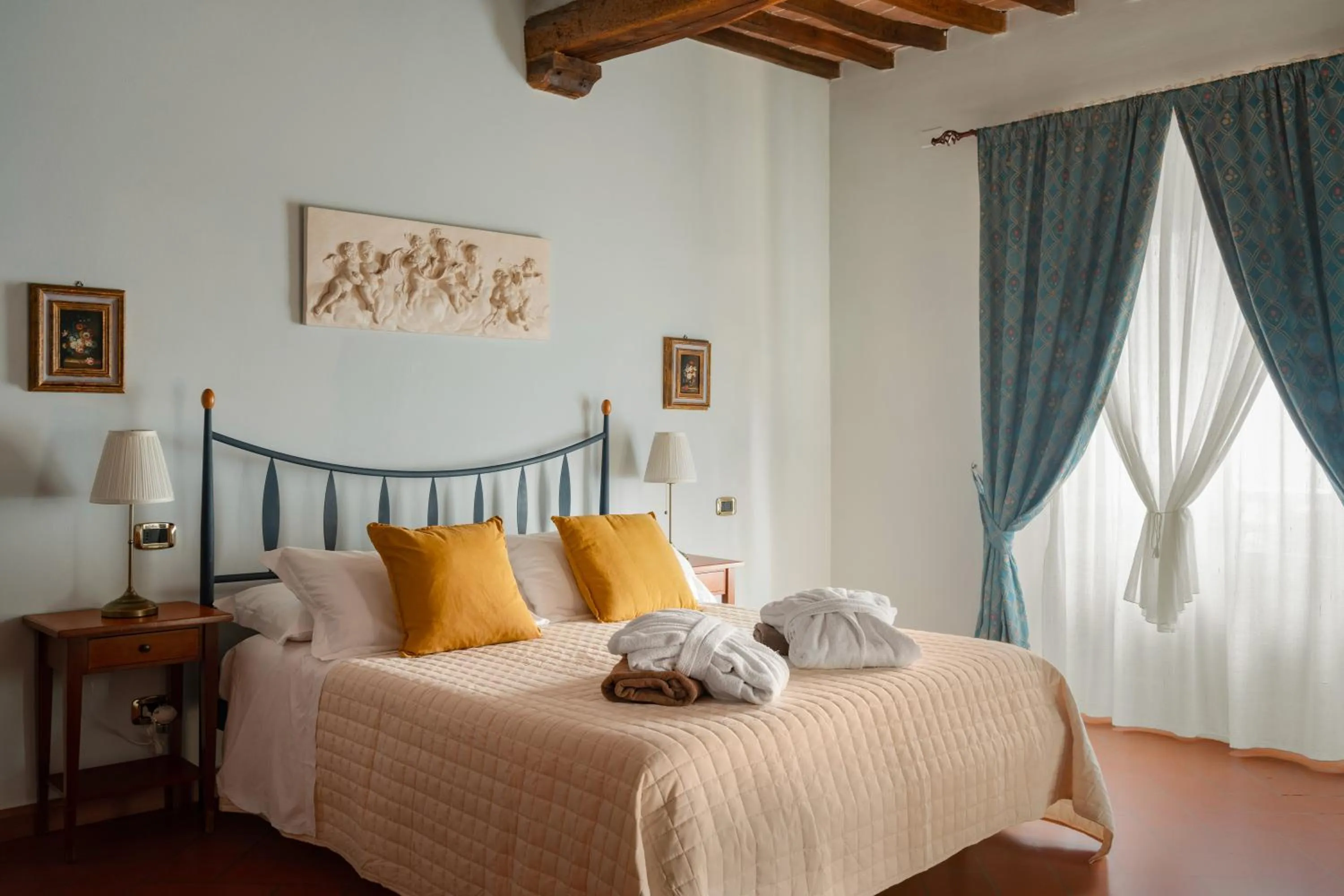 Bed in Relais Villa La Cappella